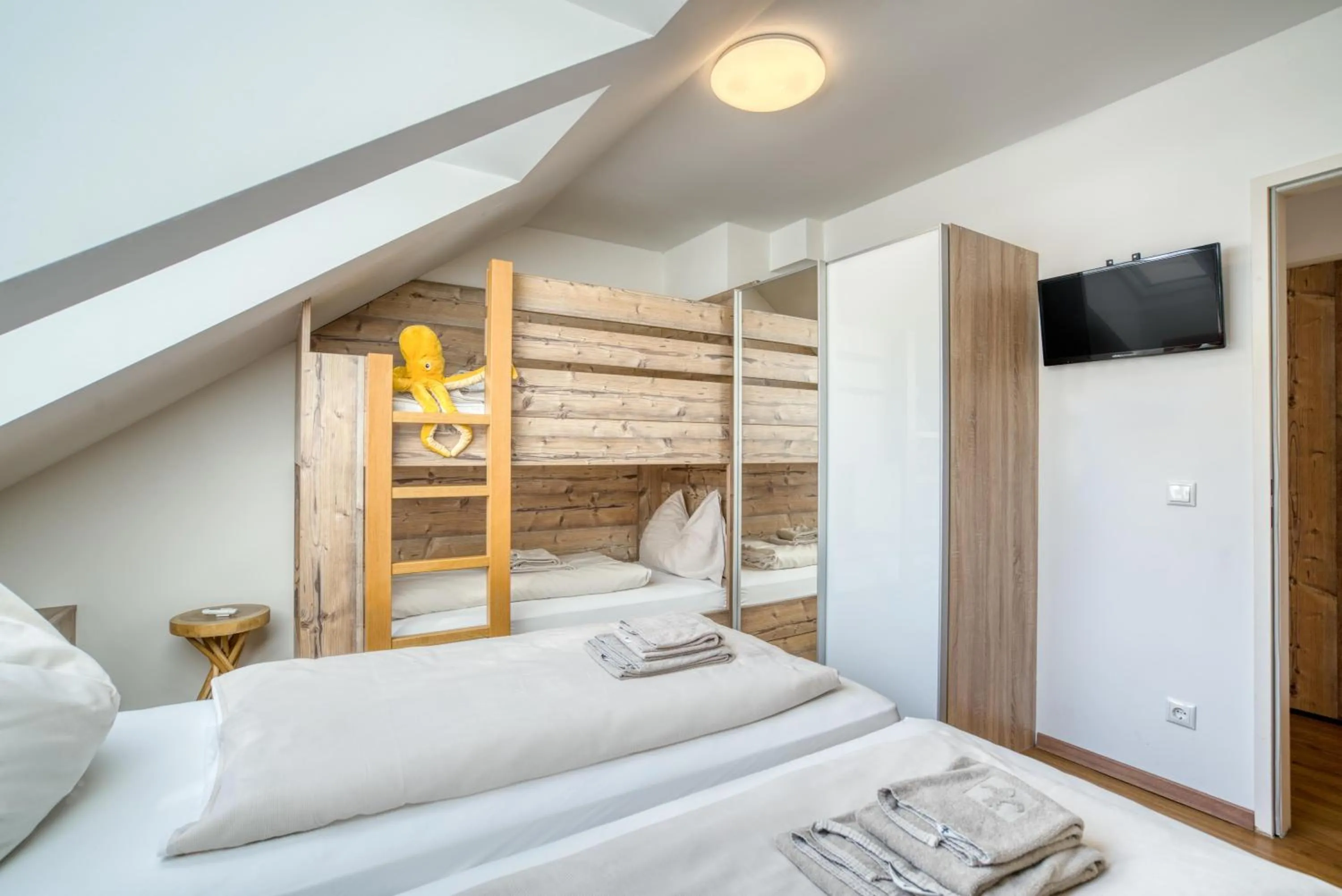 Photo of the whole room, Bed in COOEE alpin Hotel Dachstein