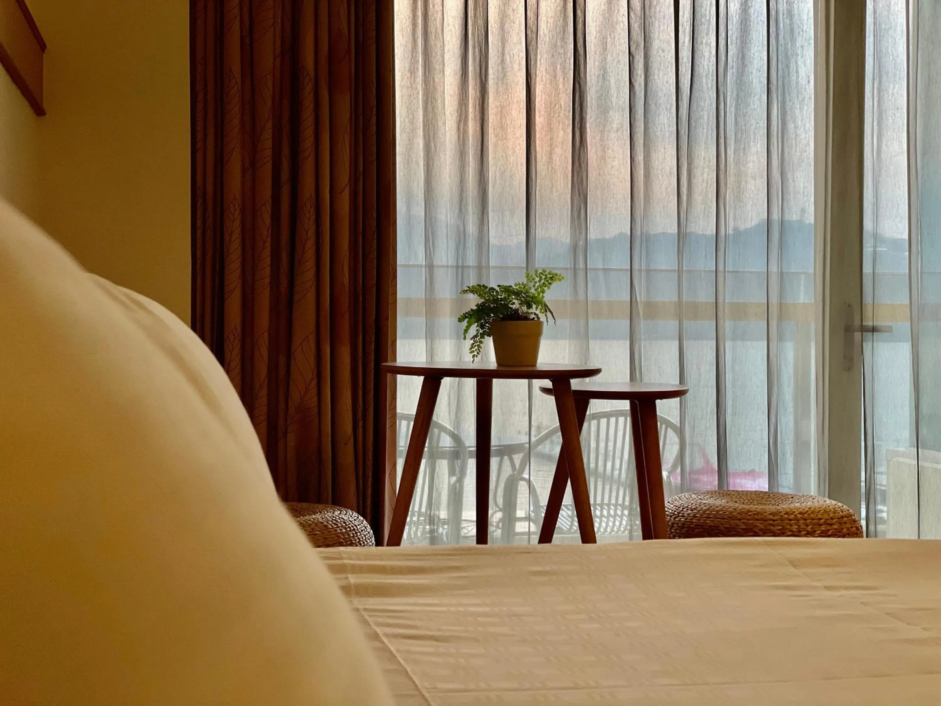 Seating area, Bed in Ming Hu B&B