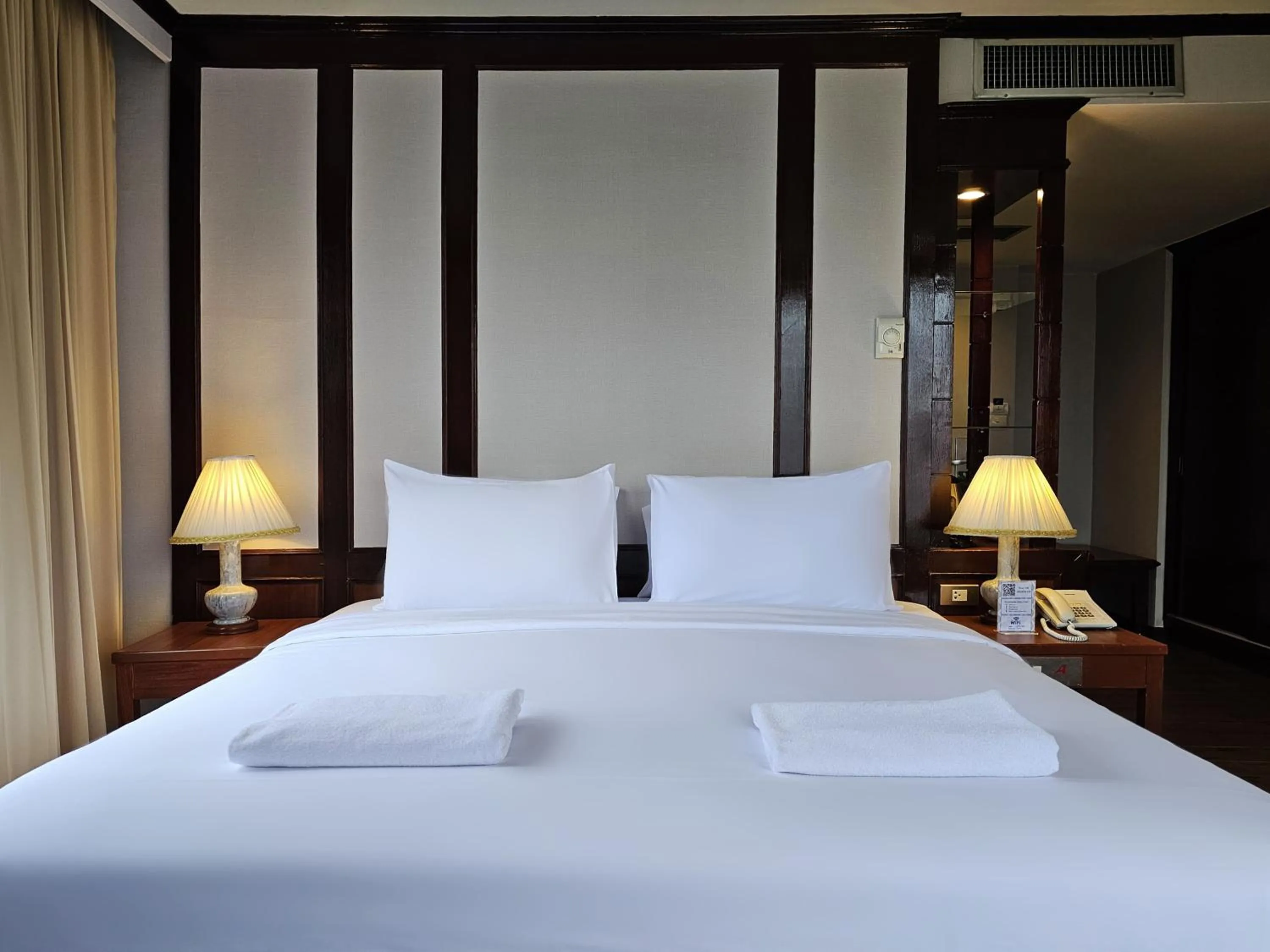 Bed in Alexander Hotel