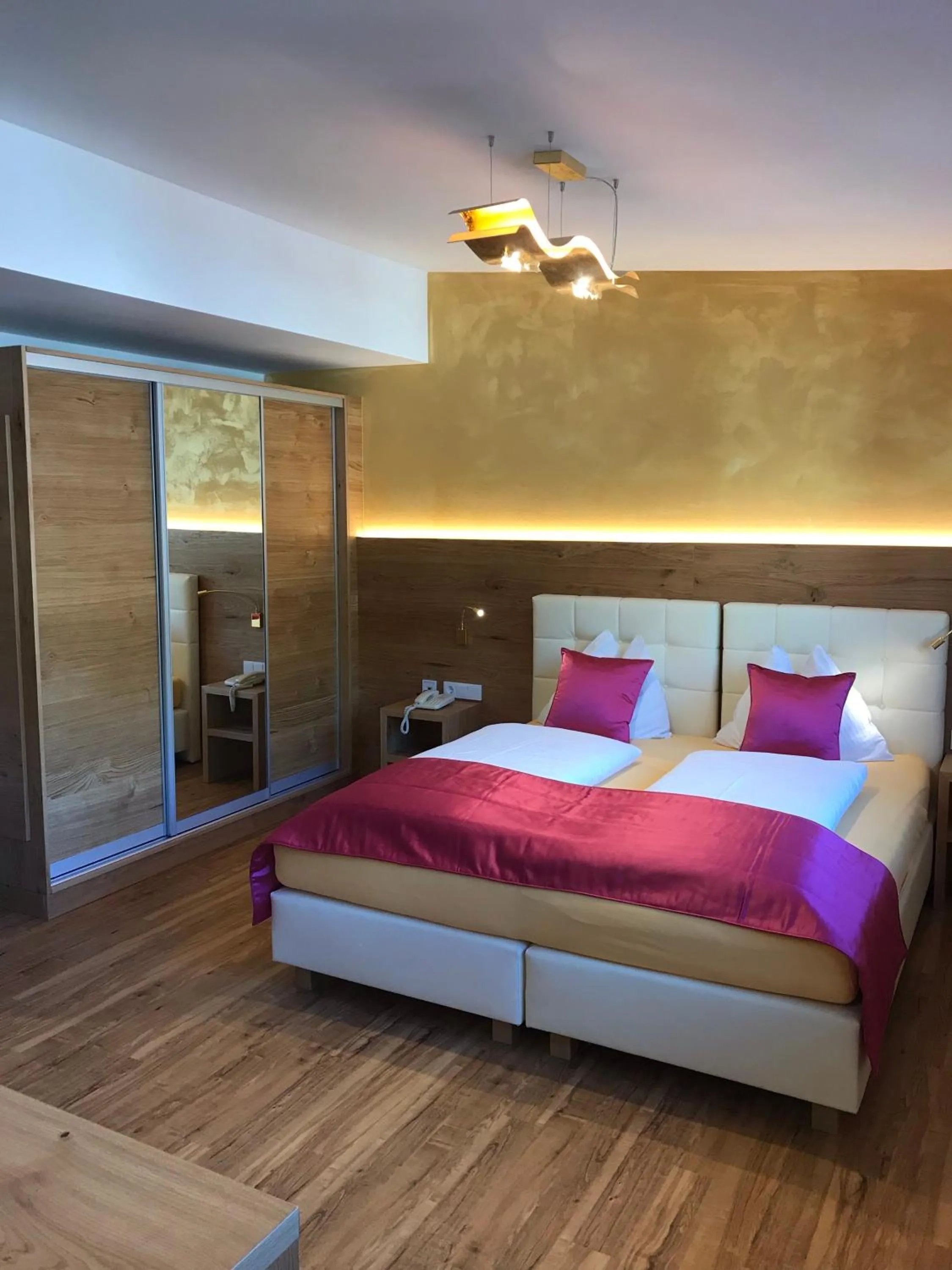 Photo of the whole room, Bed in Berger's Sporthotel