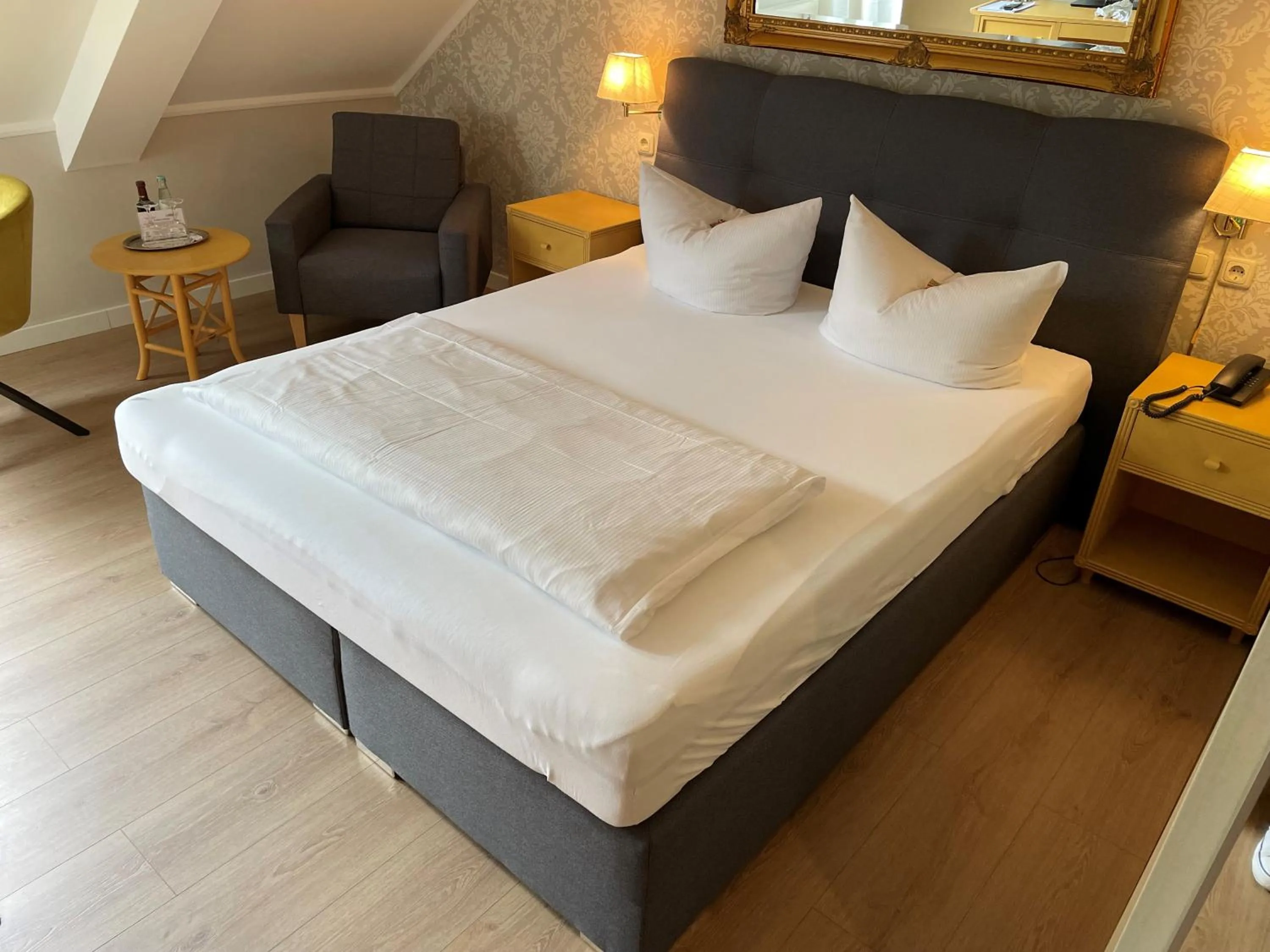 Photo of the whole room, Bed in Burg Wegberg Hotel & Eventlocation