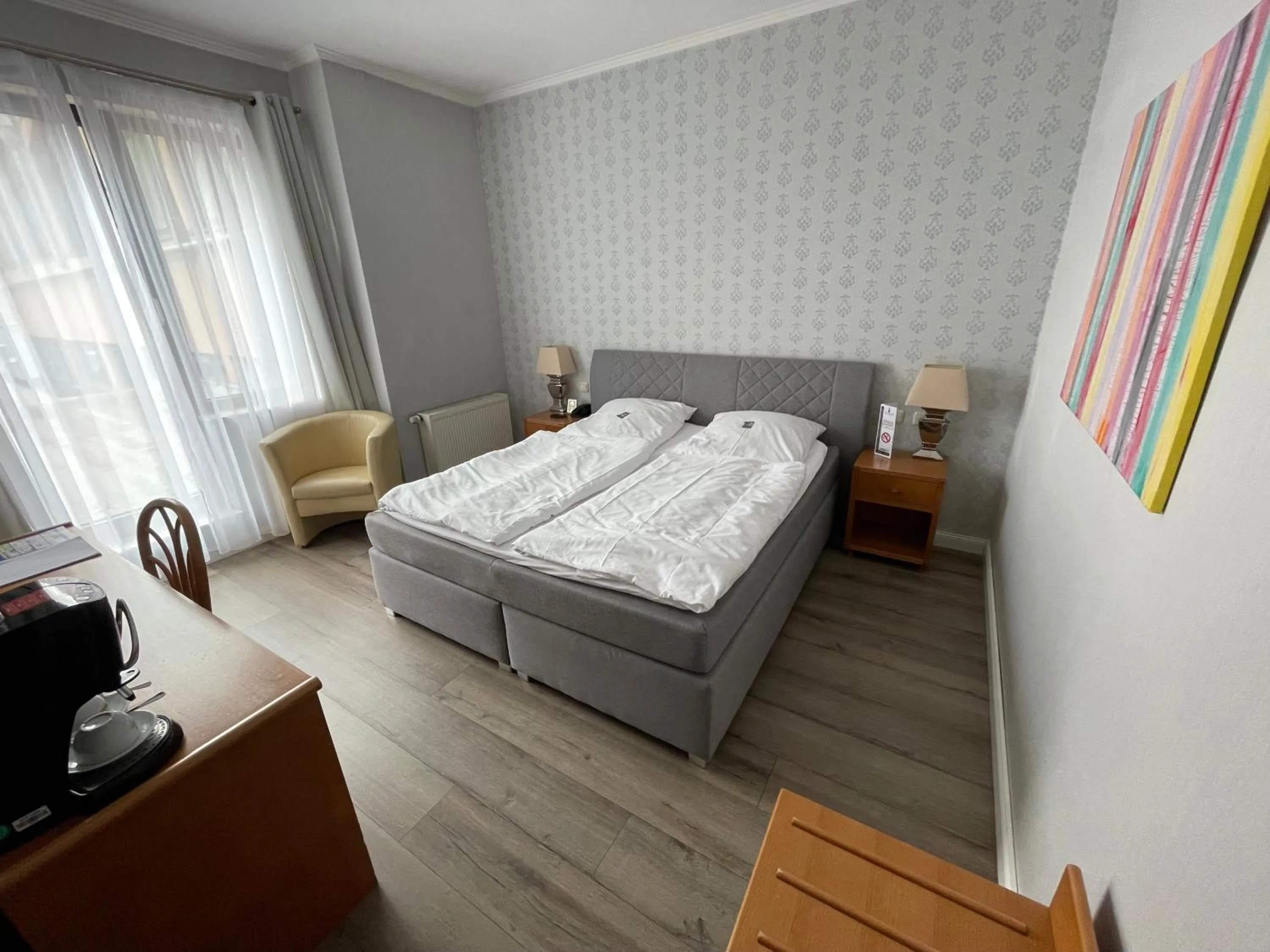 Photo of the whole room, Bed in Burg Wegberg Hotel & Eventlocation