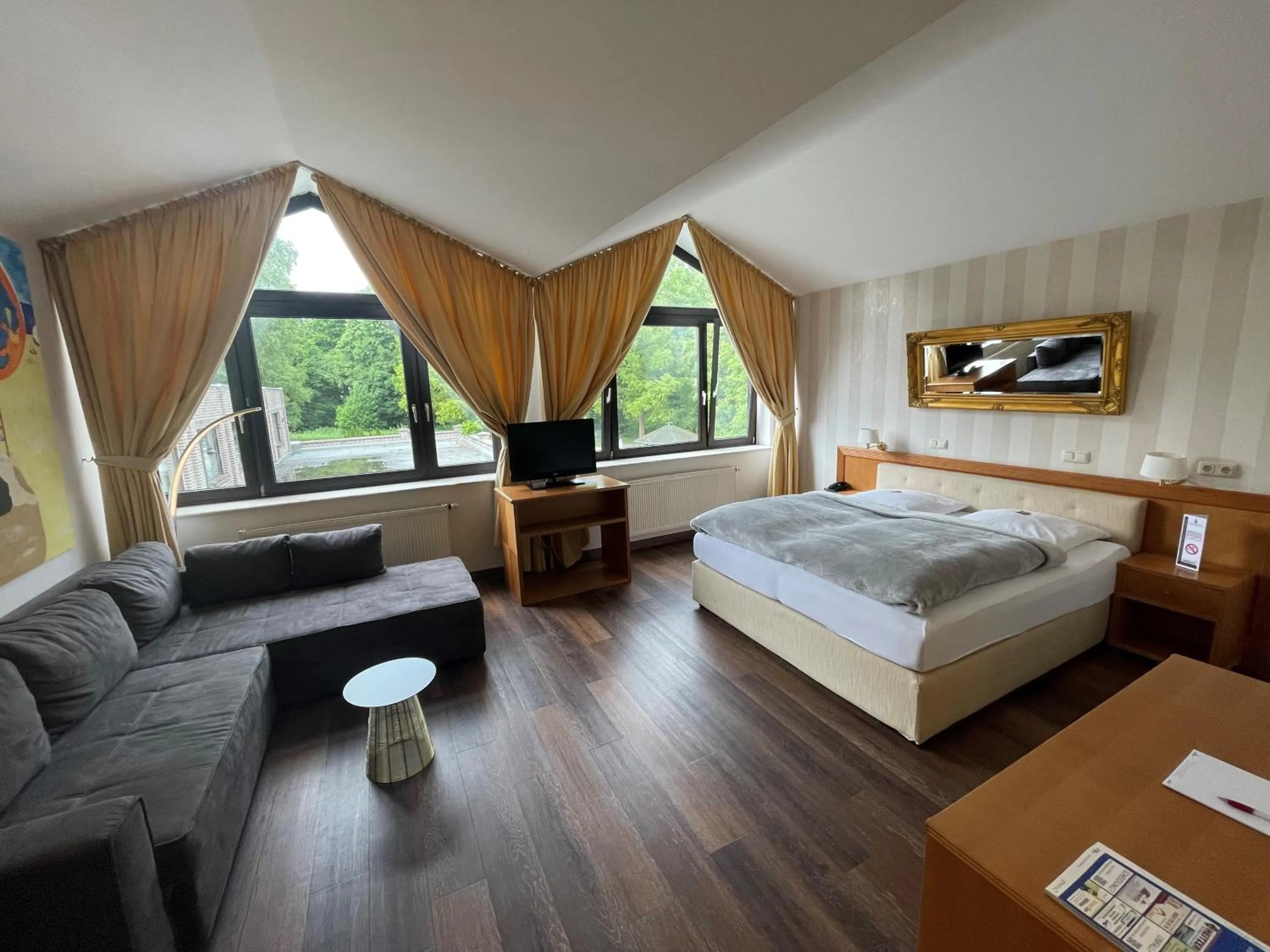 Photo of the whole room, Bed in Burg Wegberg Hotel & Eventlocation