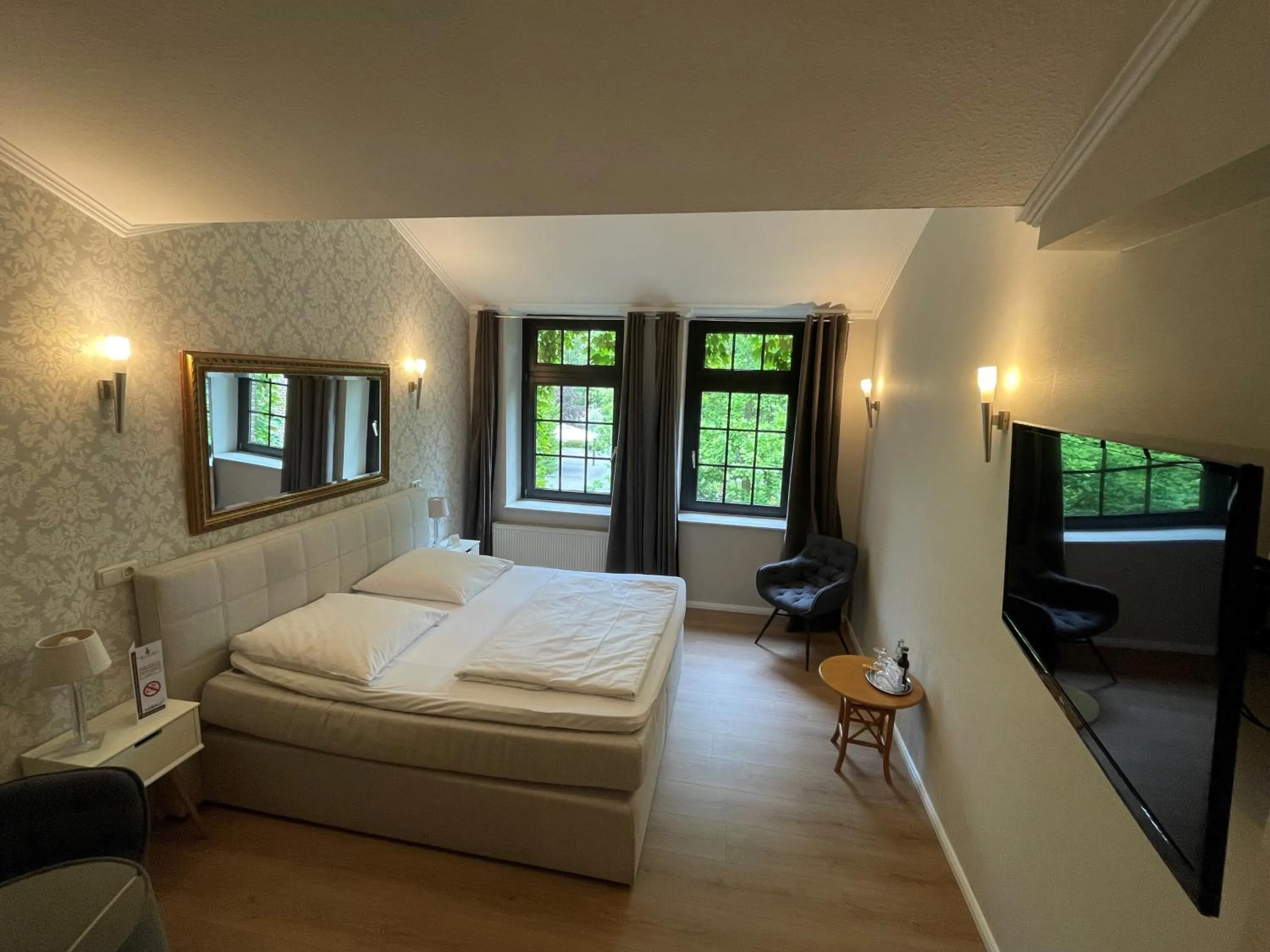 Photo of the whole room, Bed in Burg Wegberg Hotel & Eventlocation