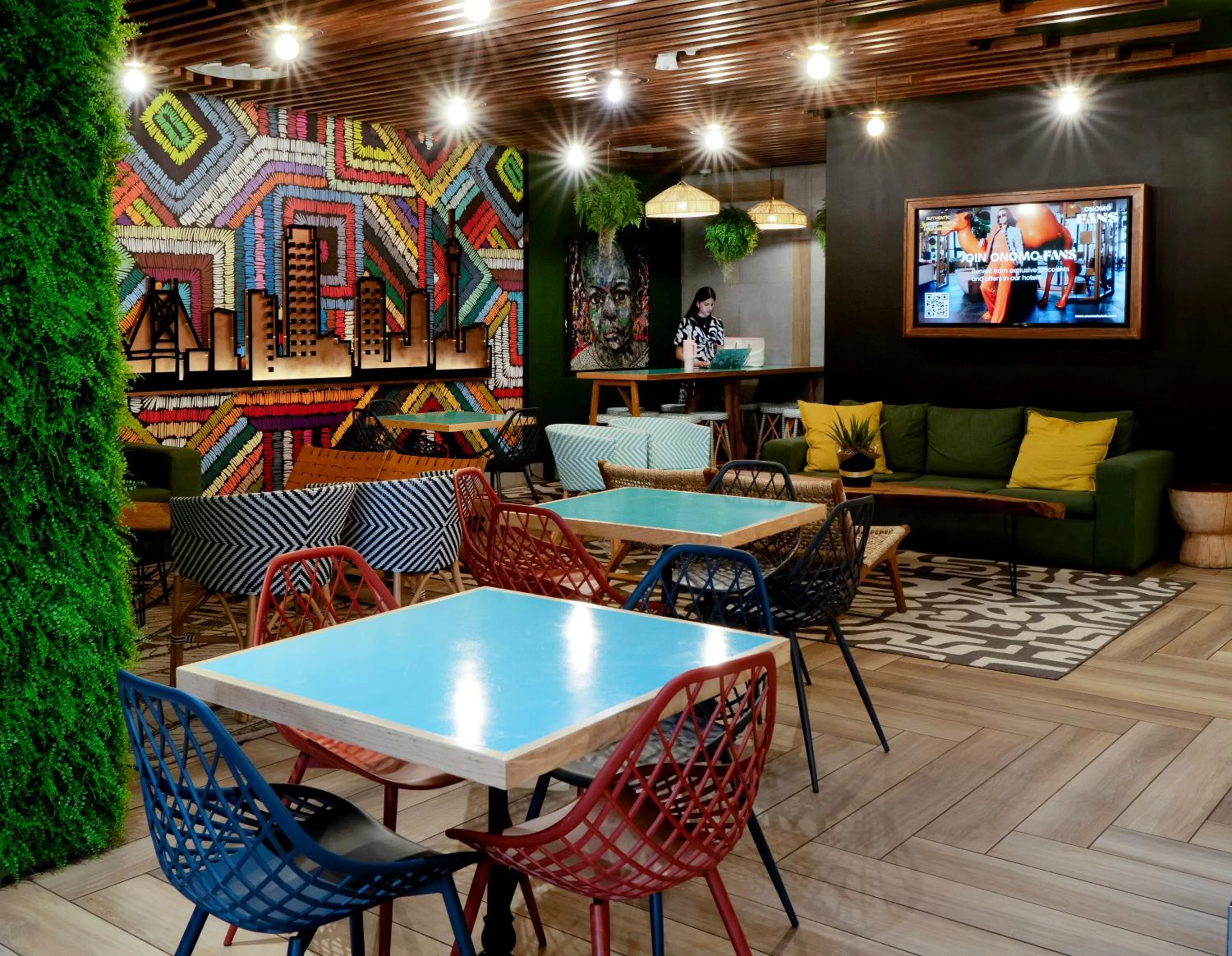 Communal lounge/ TV room in ONOMO Hotel Johannesburg Sandton