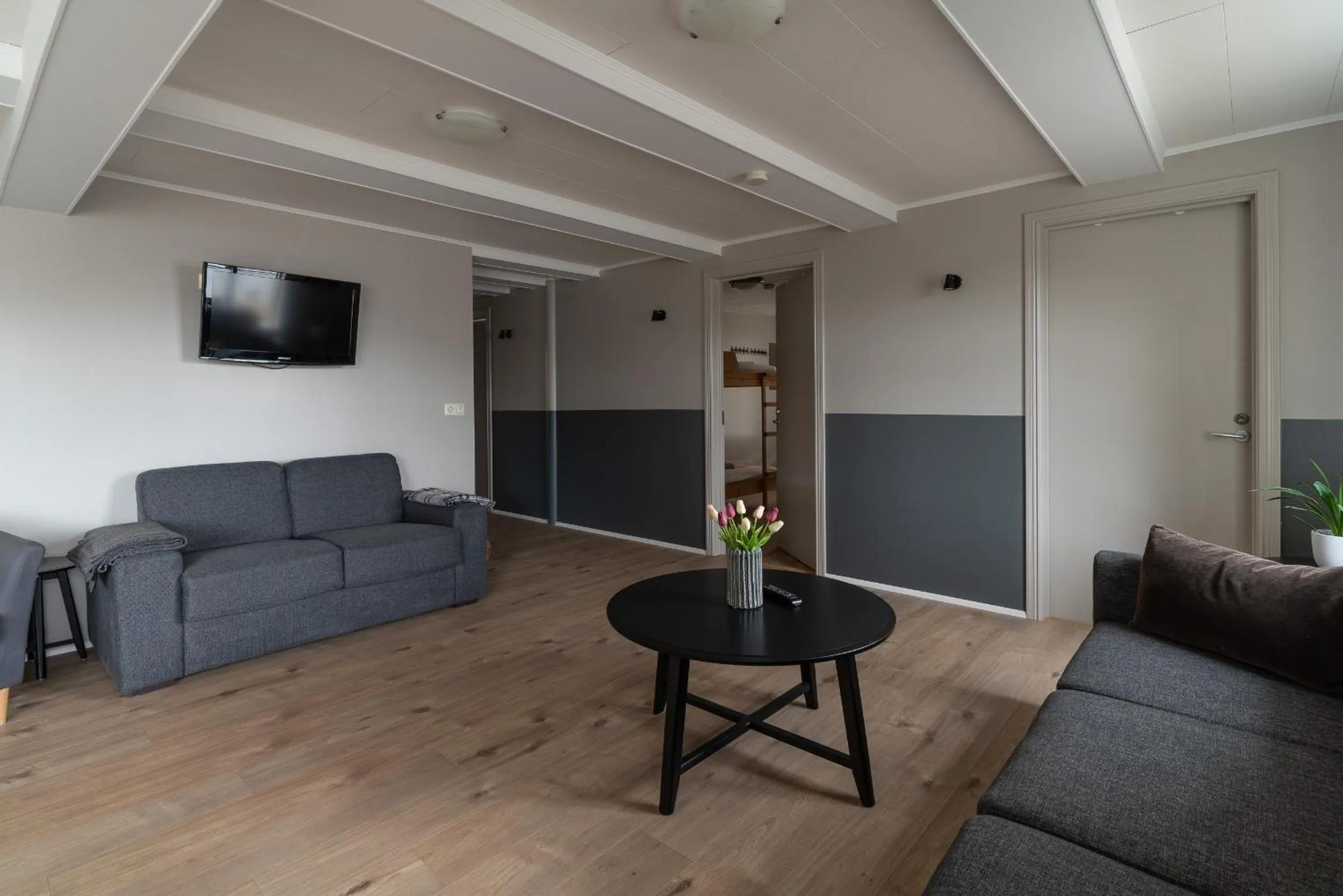 Communal lounge/ TV room in Isafjordur Hostel