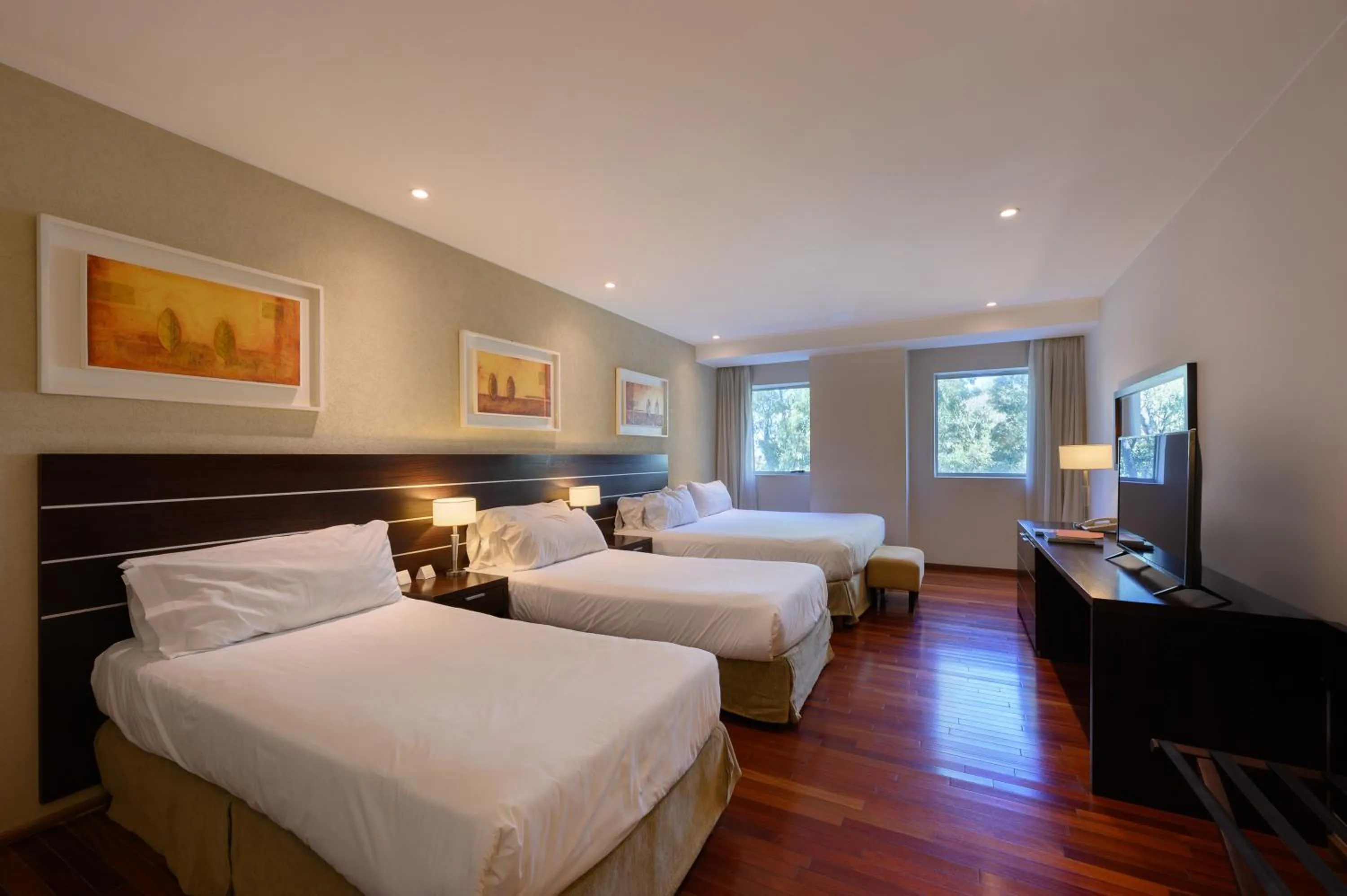 Bed in Orfeo Suites Cordoba