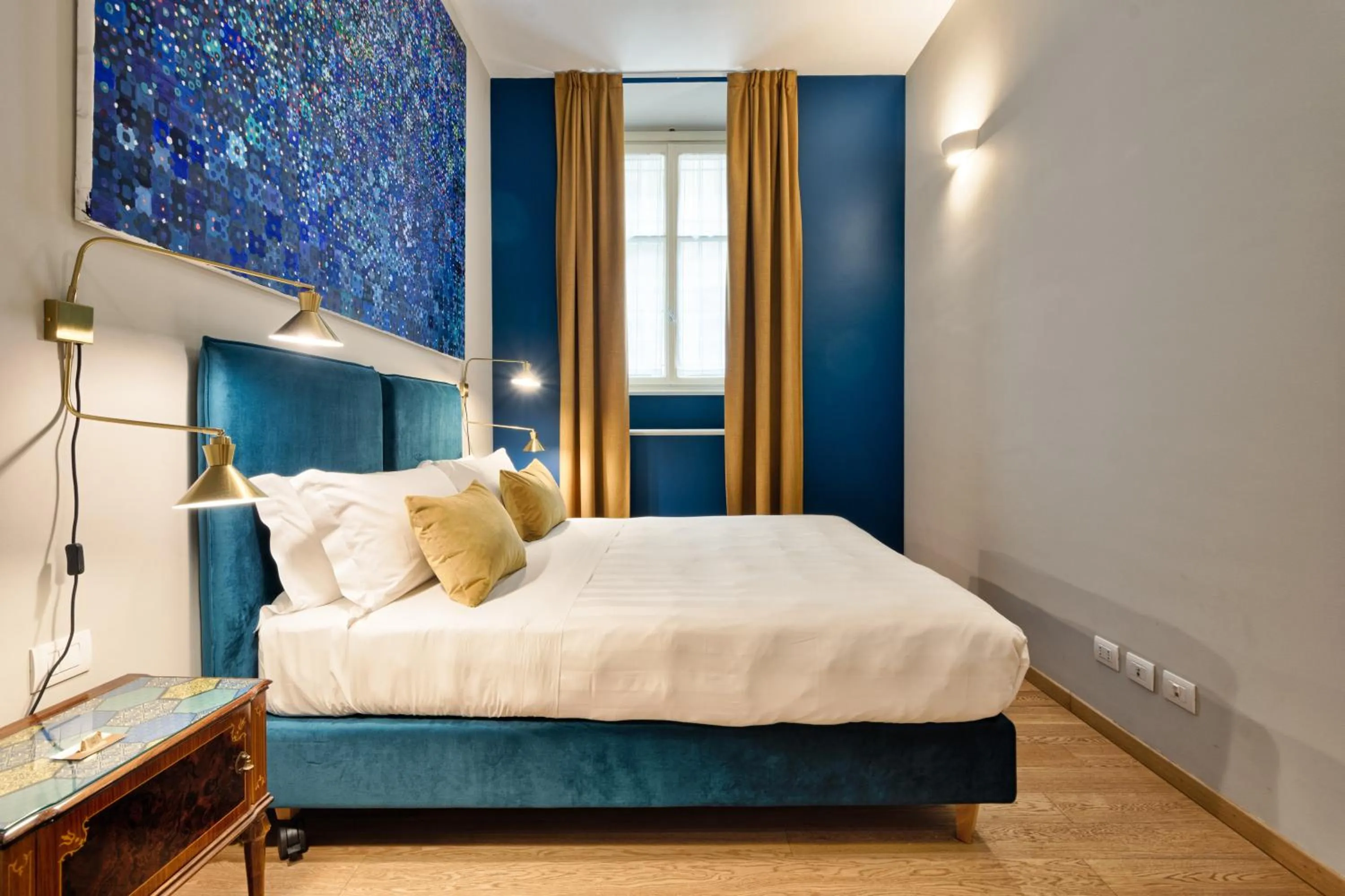 Bed in Palazzo Del Carretto-Art Apartments and Guesthouse