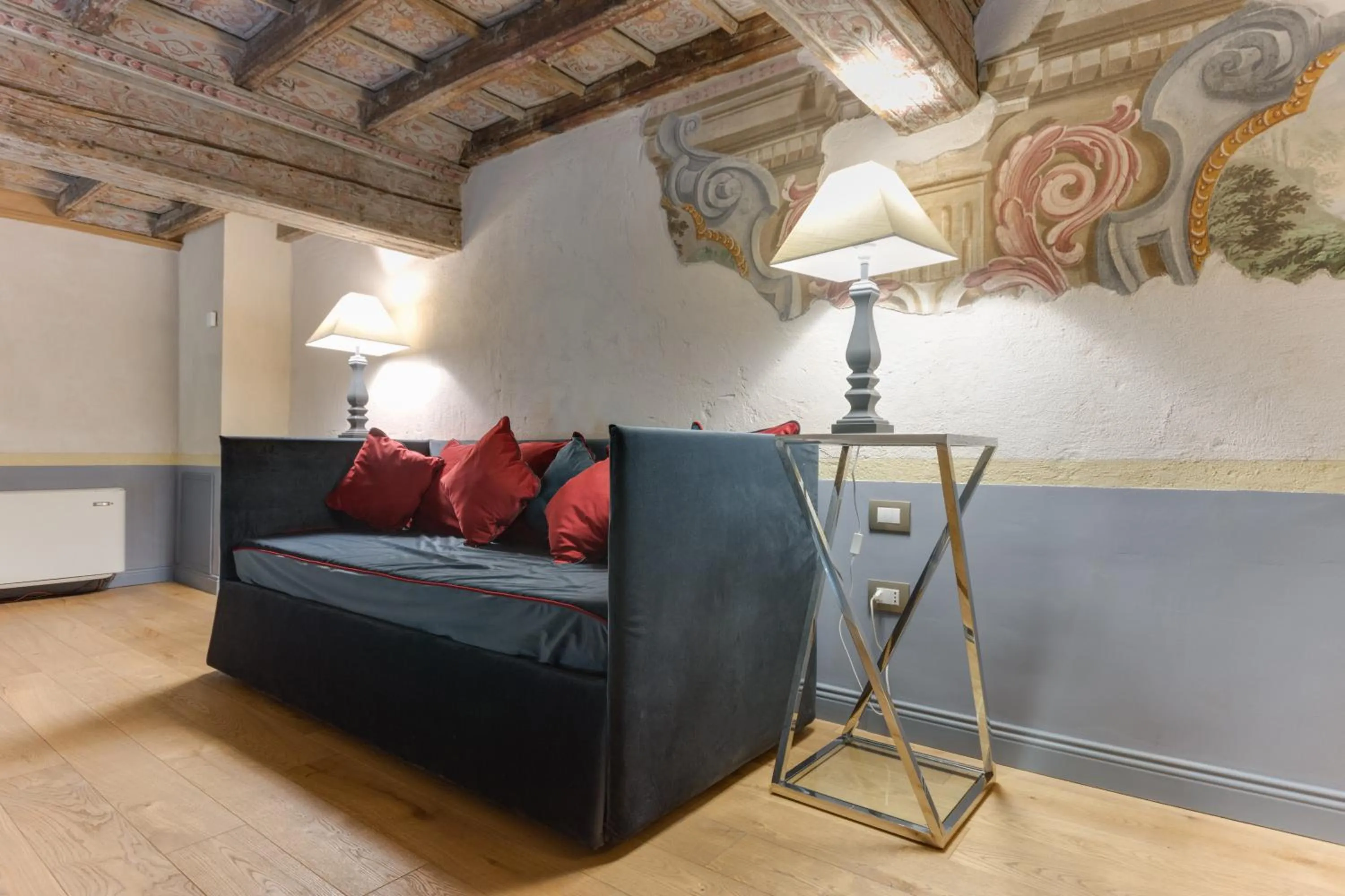 Bed in Palazzo Del Carretto-Art Apartments and Guesthouse