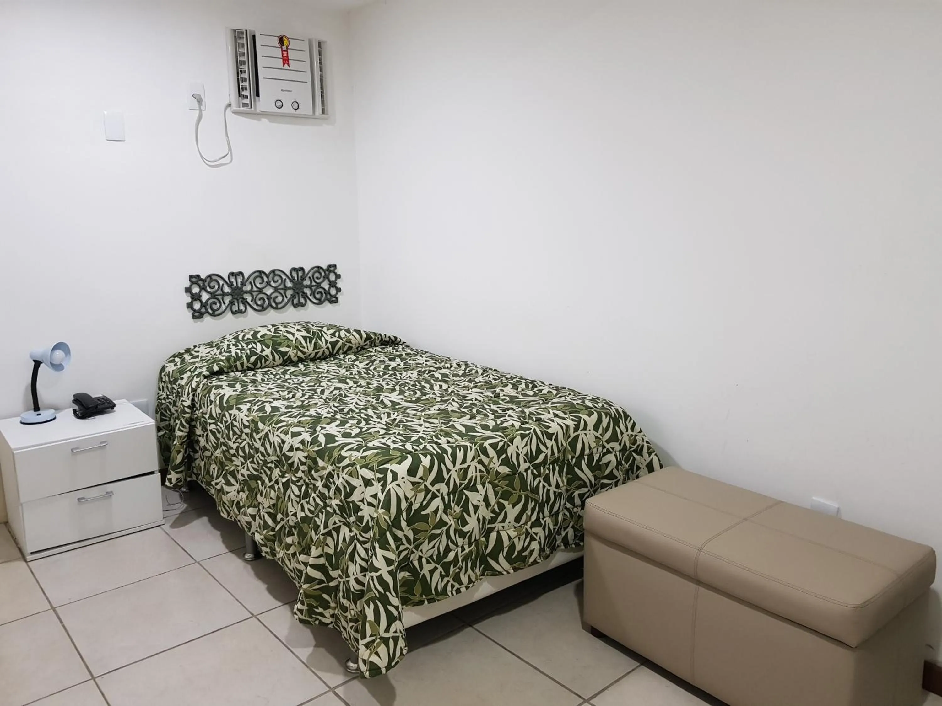 Bed in Casa do Manequinho Hotel e Restaurante