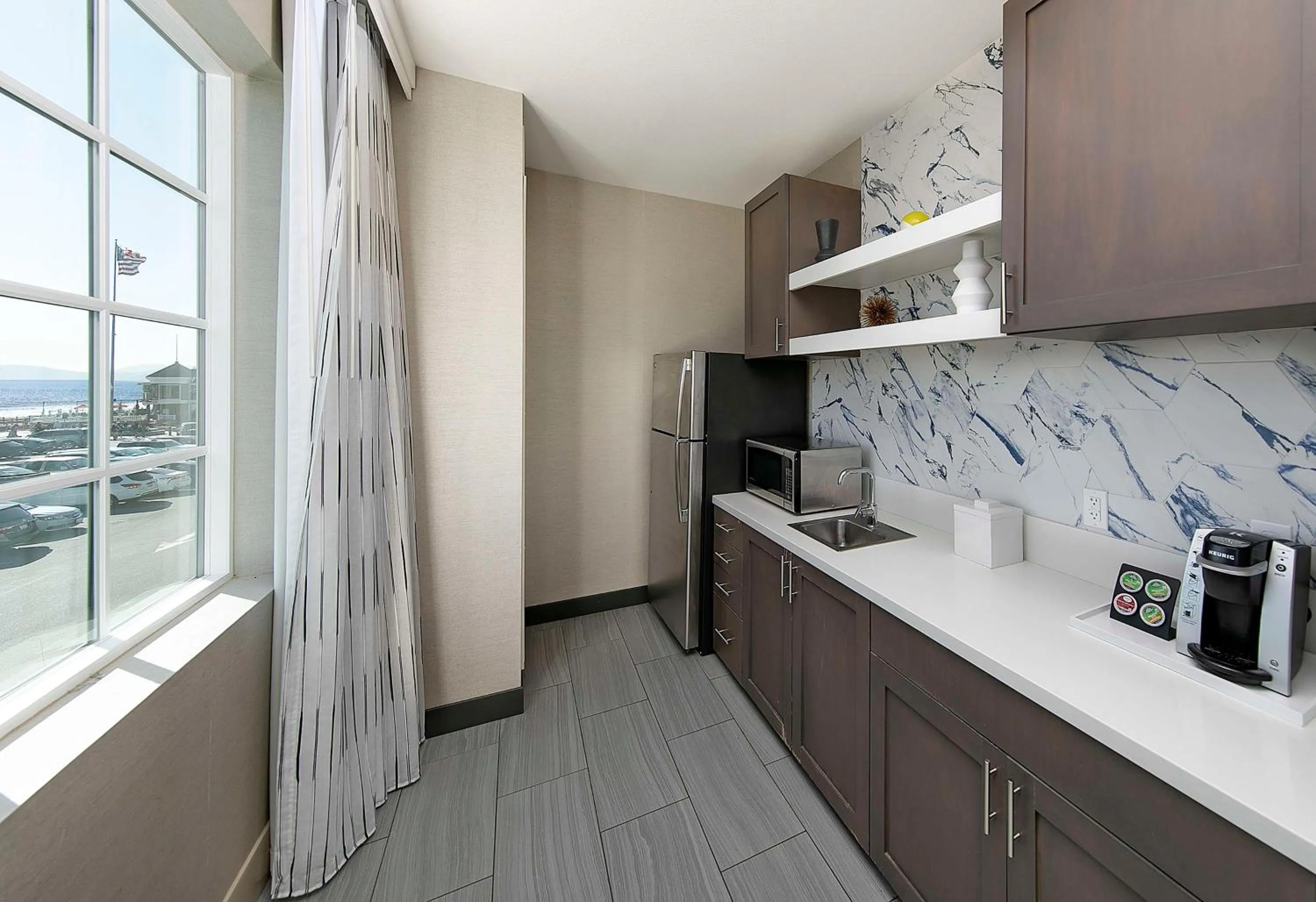 Kitchen or kitchenette in Inn at the Pier Pismo Beach, Curio Collection by Hilton