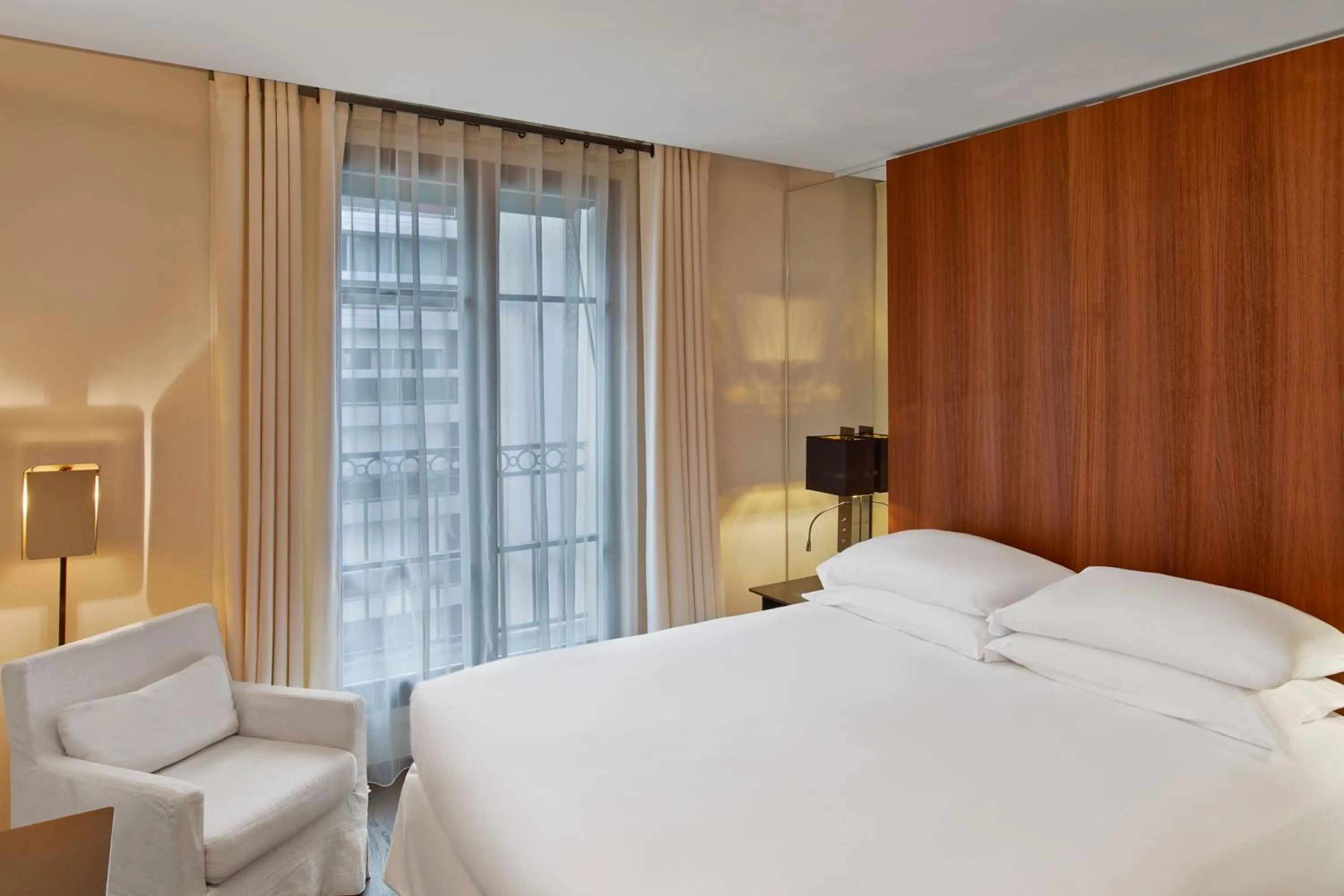 Photo of the whole room, Bed in Le Metropolitan, Paris Tour Eiffel, a Tribute Portfolio Hotel