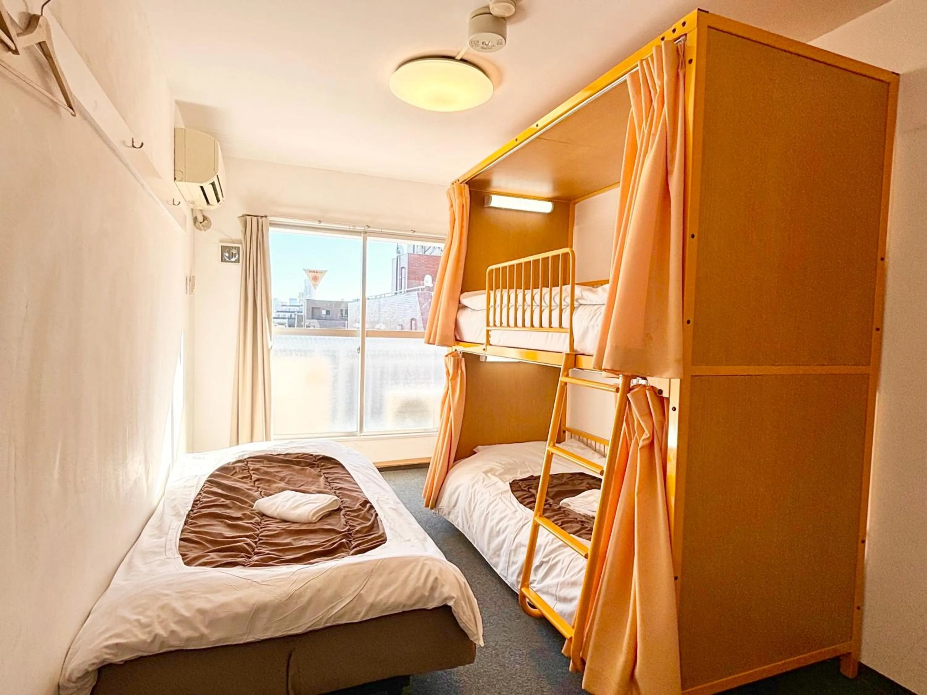 Bed in Sakura Hotel Nippori