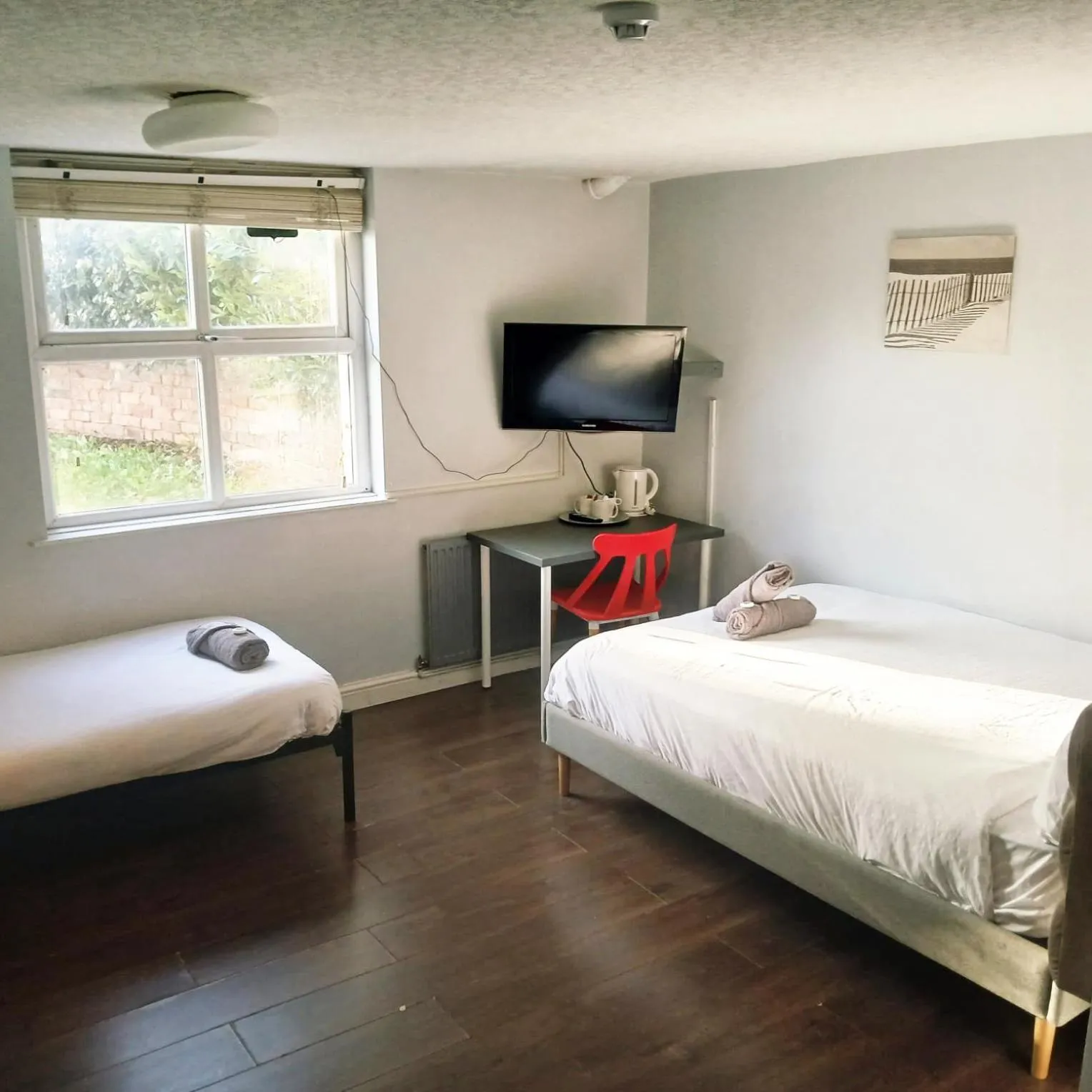 Bed in Queens Guesthouse Manchester