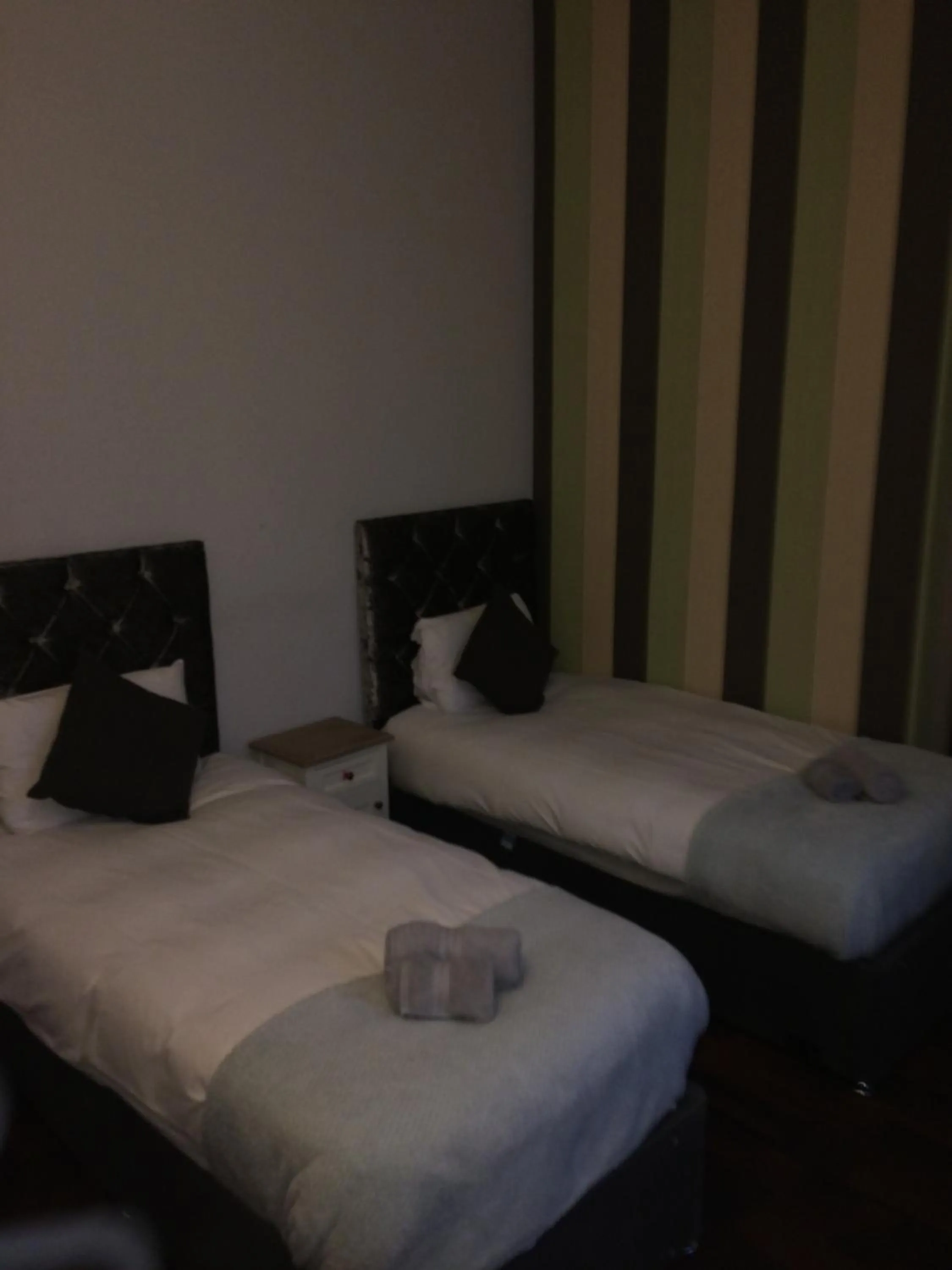 Bed in Queens Guesthouse Manchester