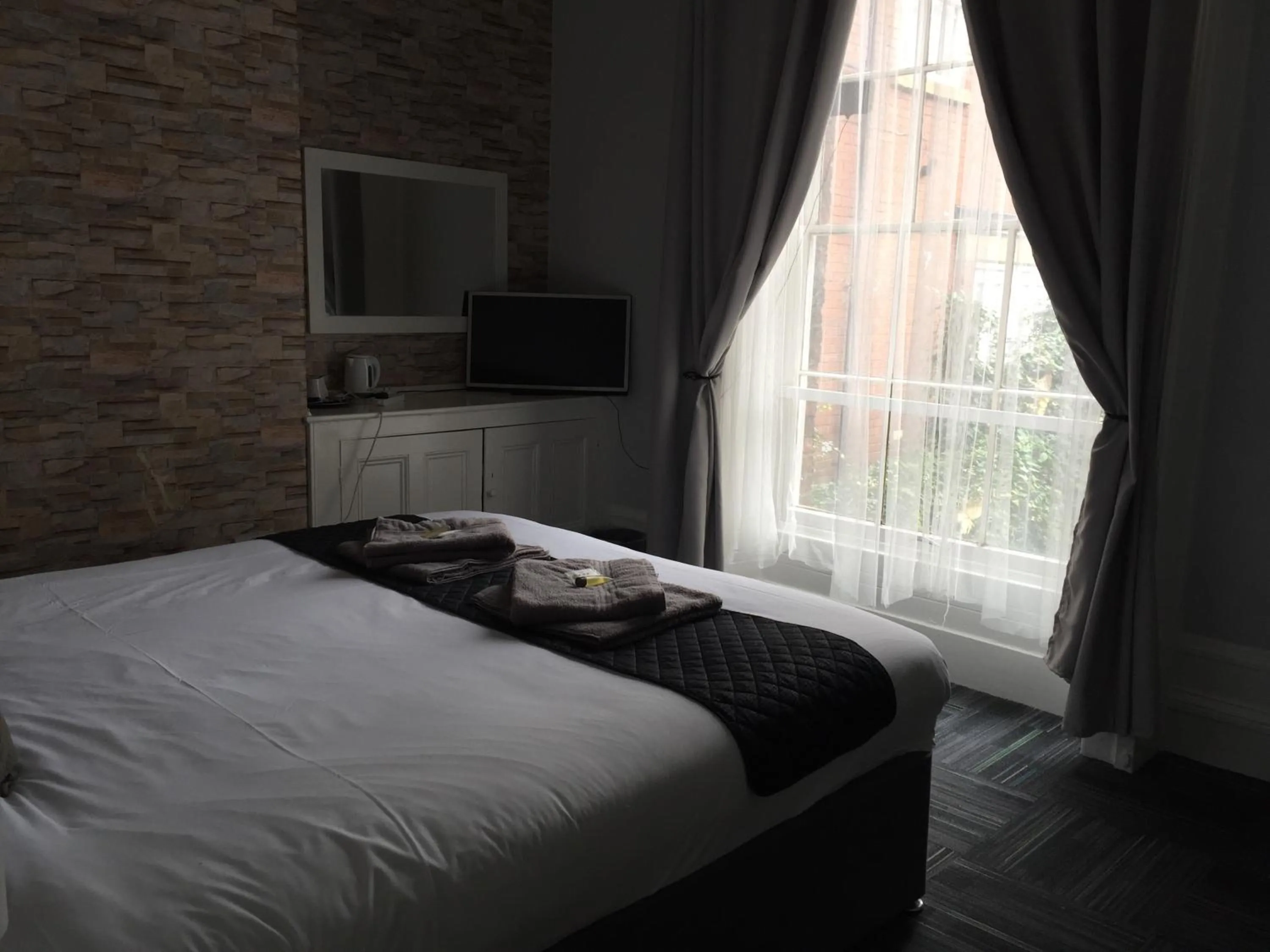 Decorative detail, Bed in Queens Guesthouse Manchester