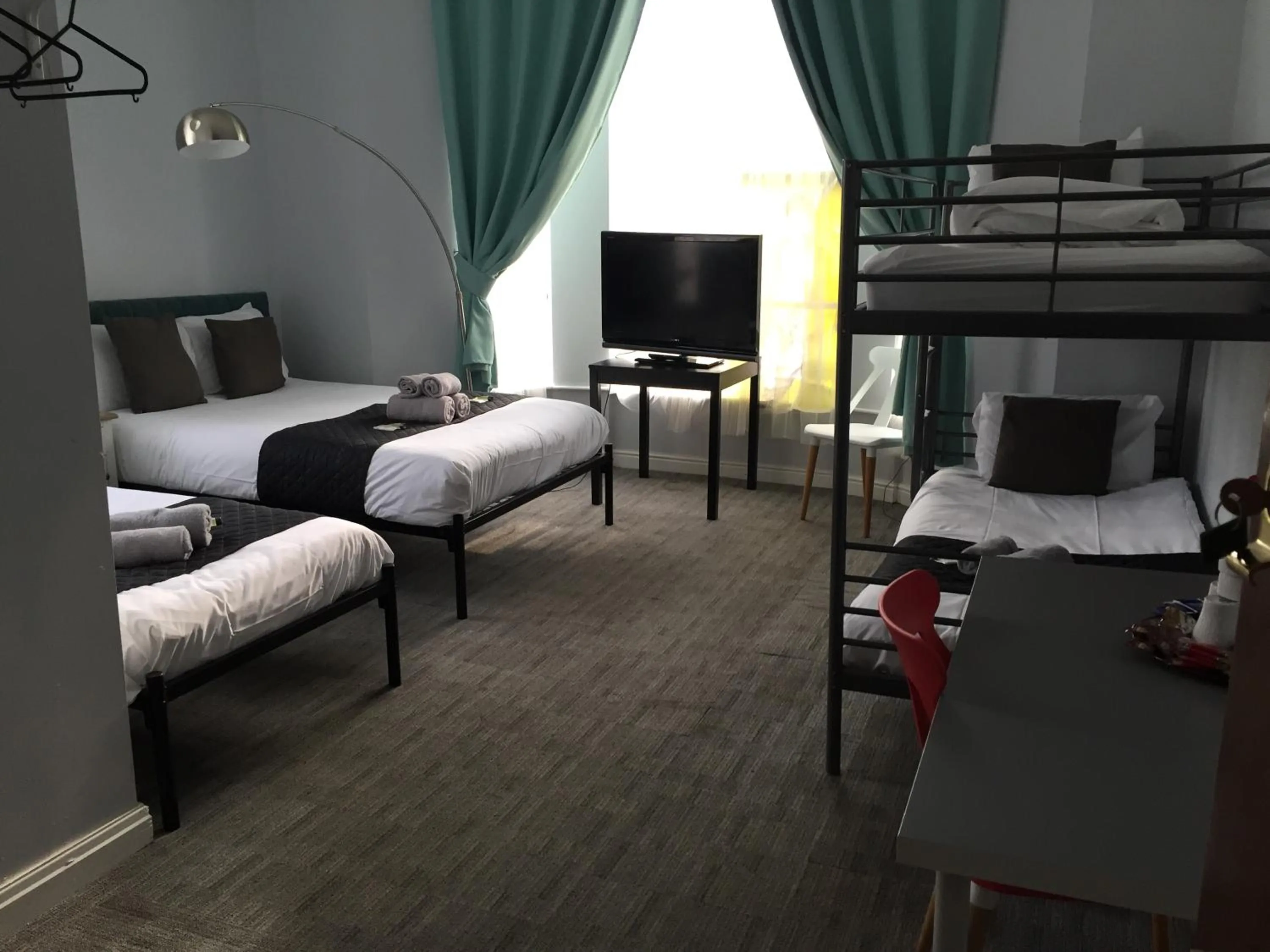 Bed in Queens Guesthouse Manchester