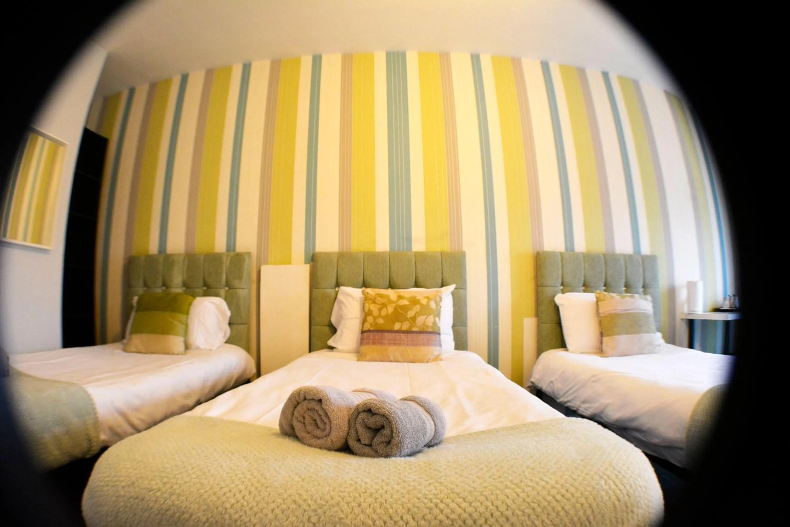 Bed in Queens Guesthouse Manchester