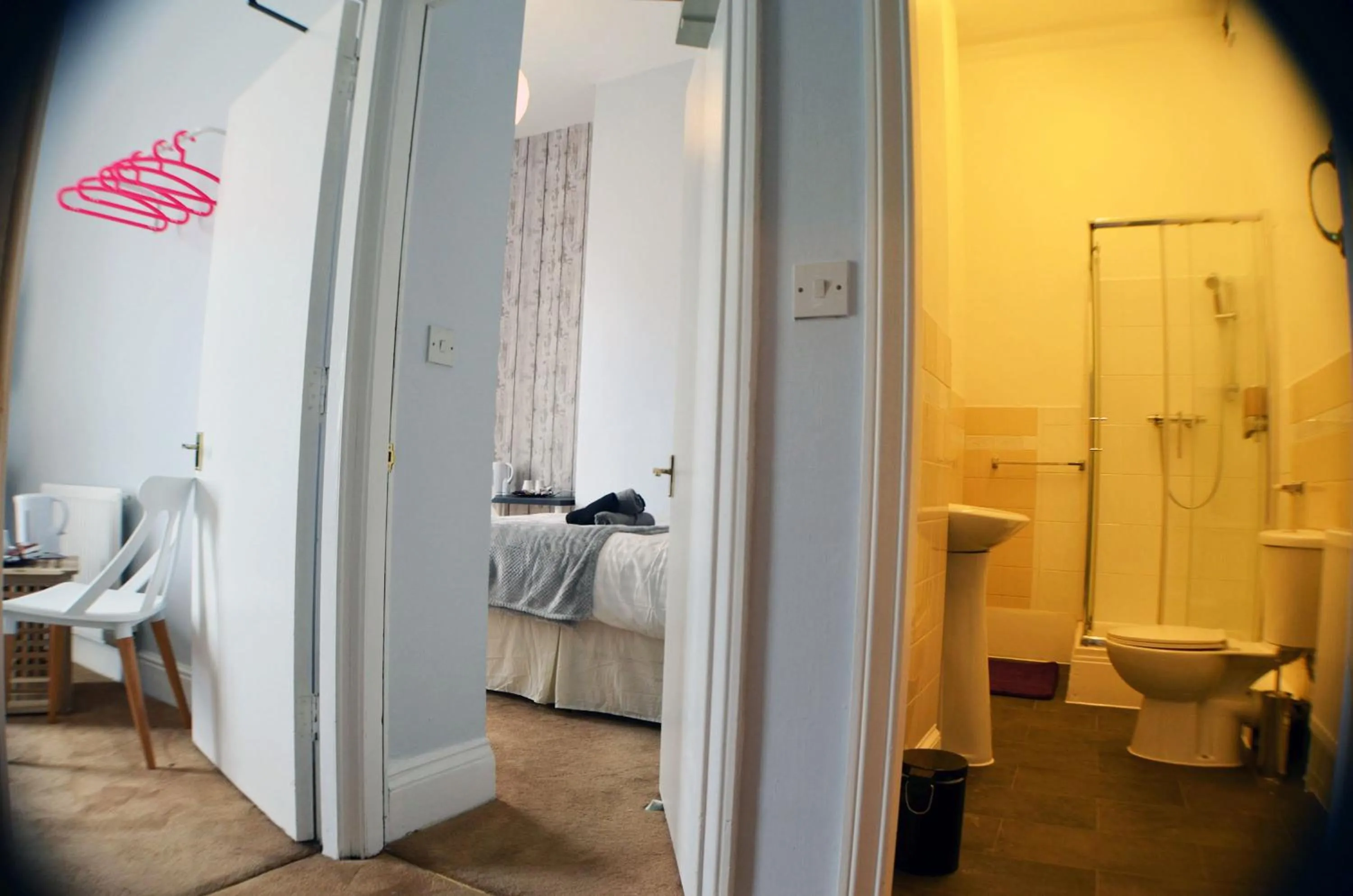 Bedroom in Queens Guesthouse Manchester