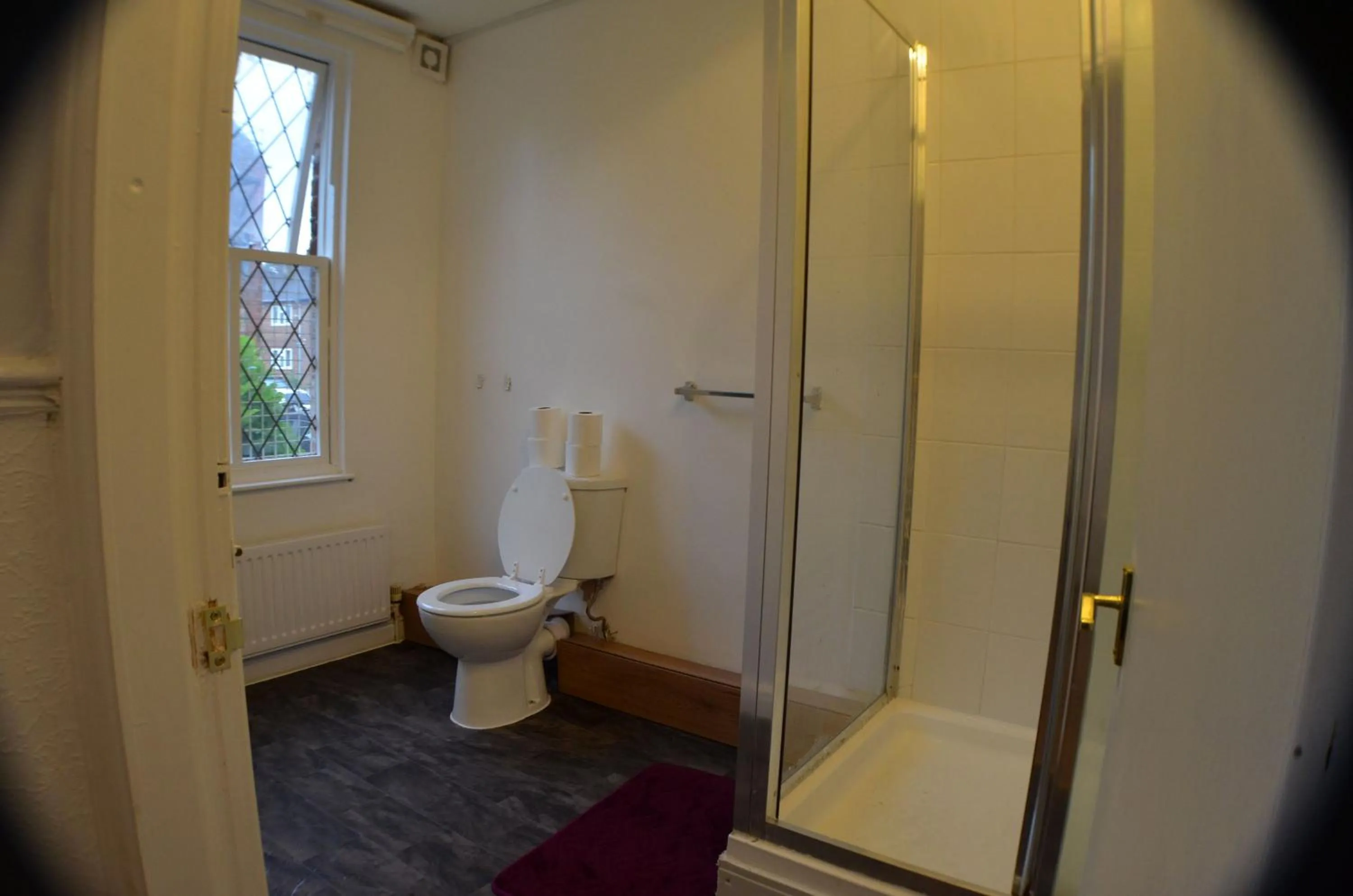 Bedroom in Queens Guesthouse Manchester