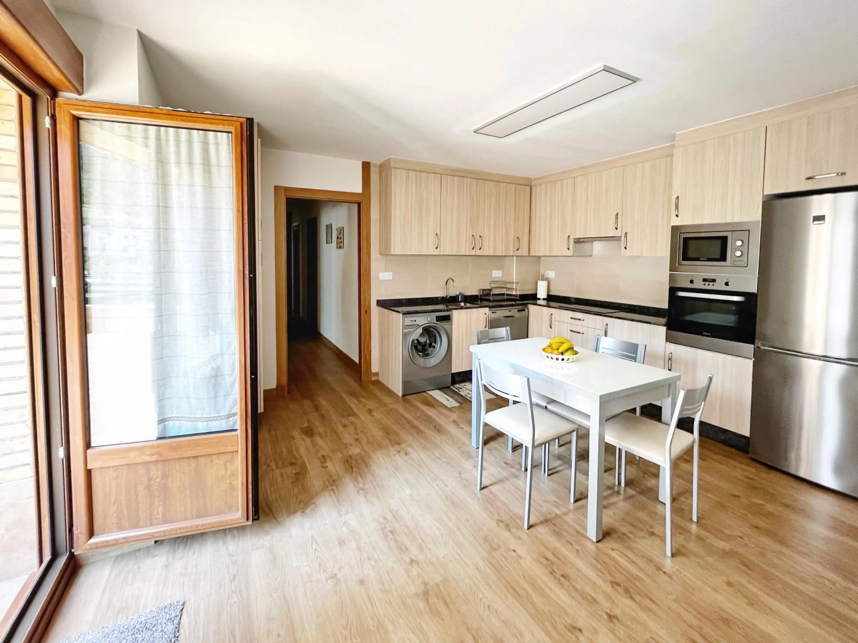Kitchen or kitchenette in Apartamentos Valbuena