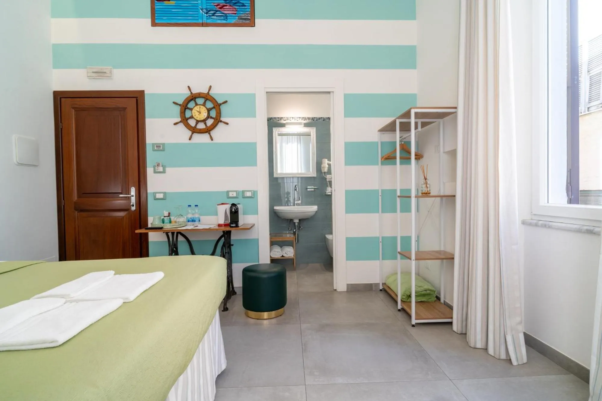 Bed in Teresa Rooms & Suites