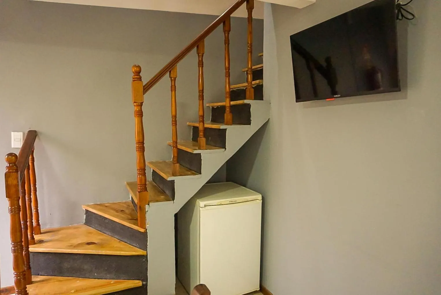 Communal lounge/ TV room in Apart Hotel Libertador