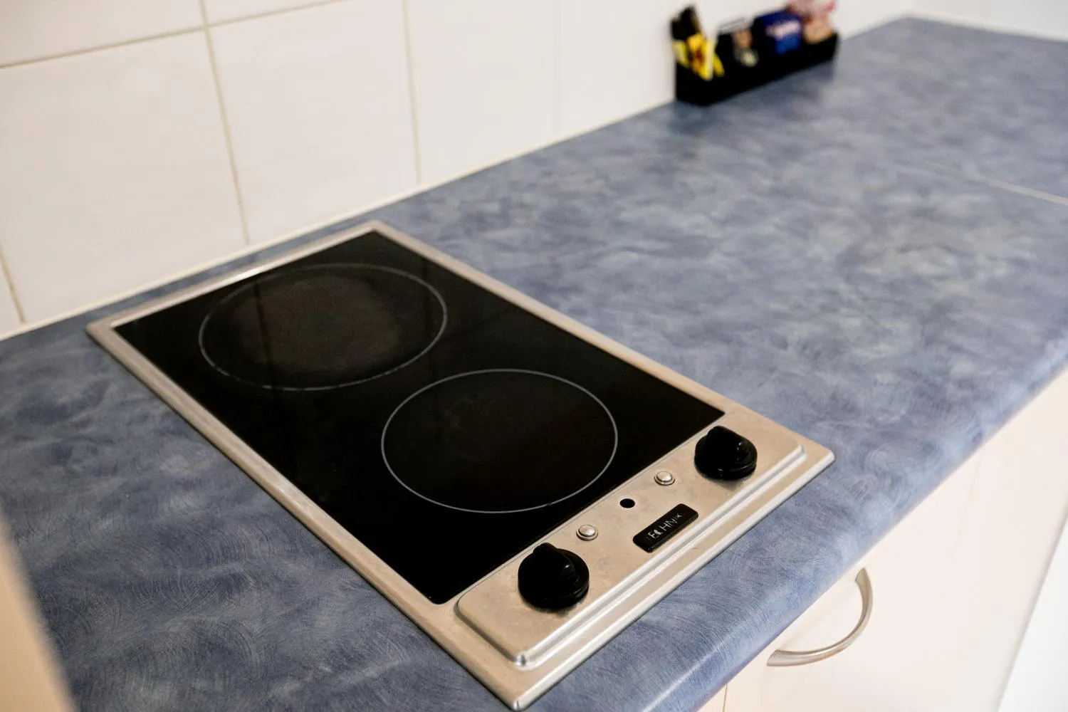 Kitchen or kitchenette in Sunlit Waters Studio Apartments
