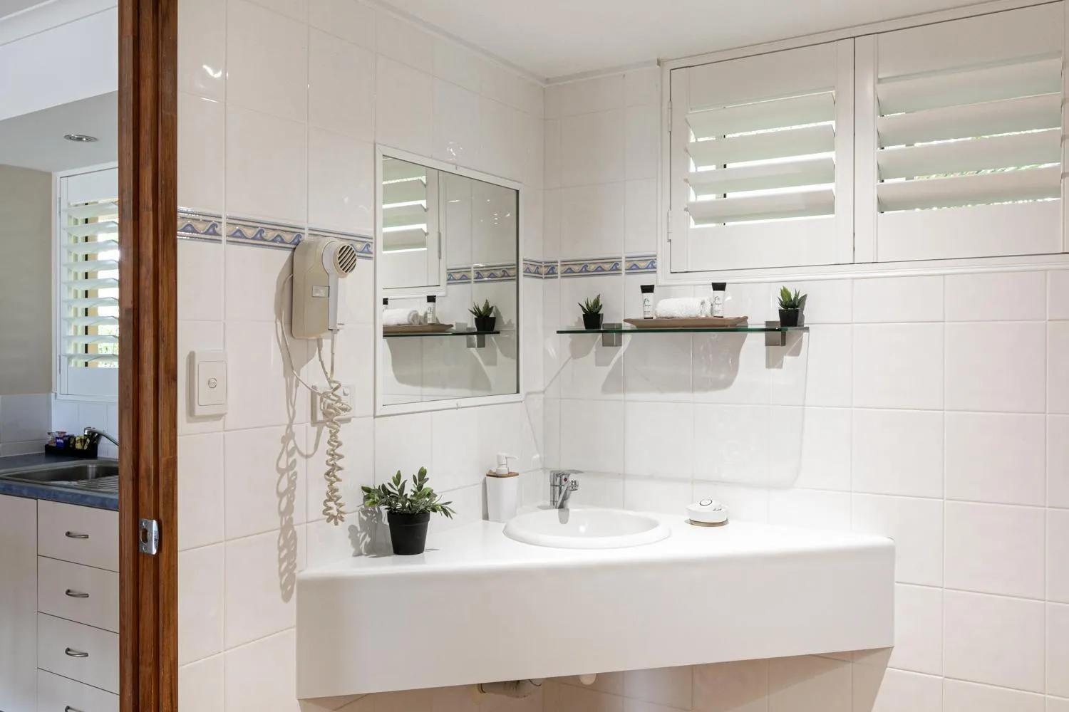 Bathroom in Sunlit Waters Studio Apartments