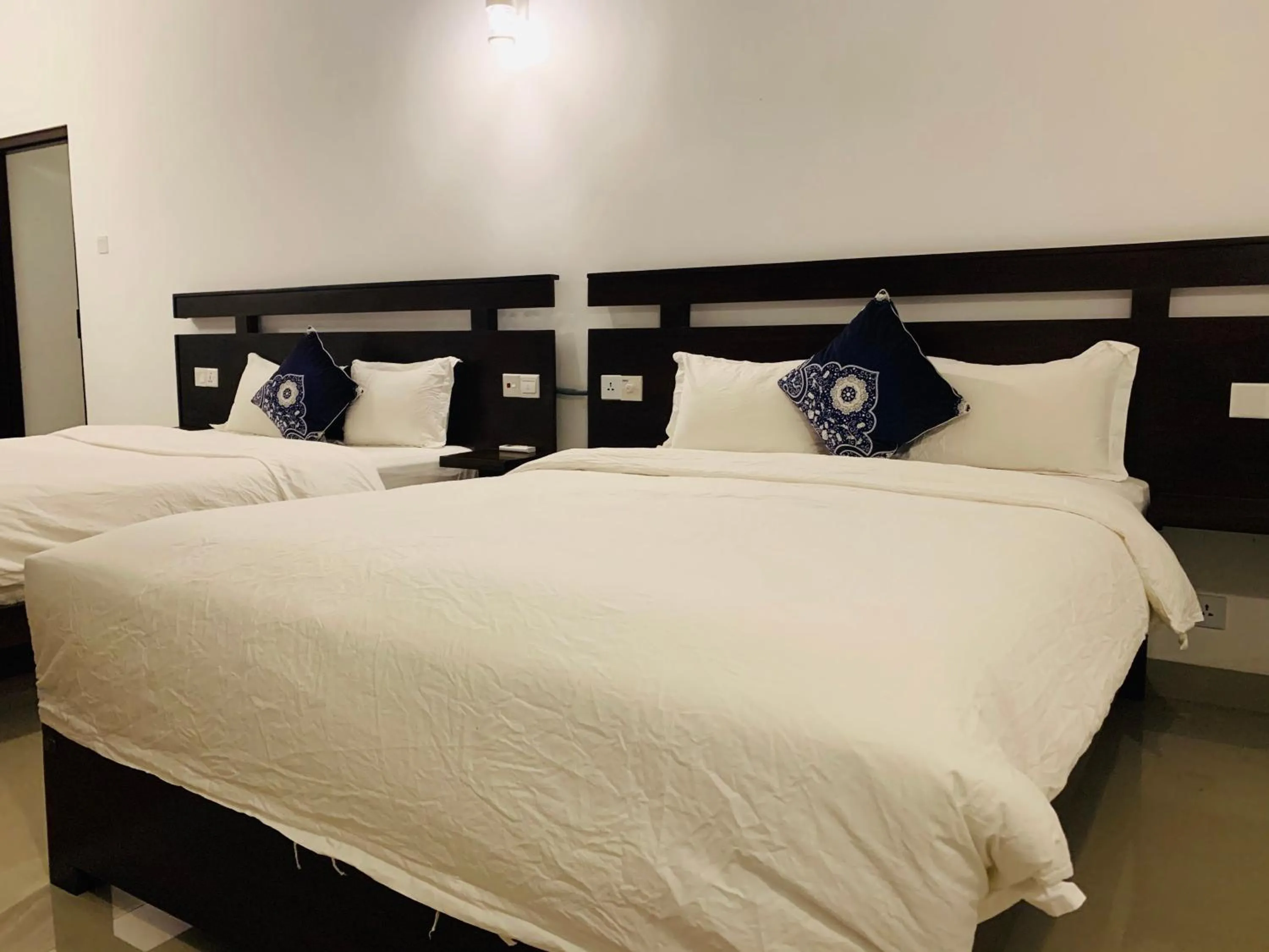 Bed in Lavenro Hotel & Resort