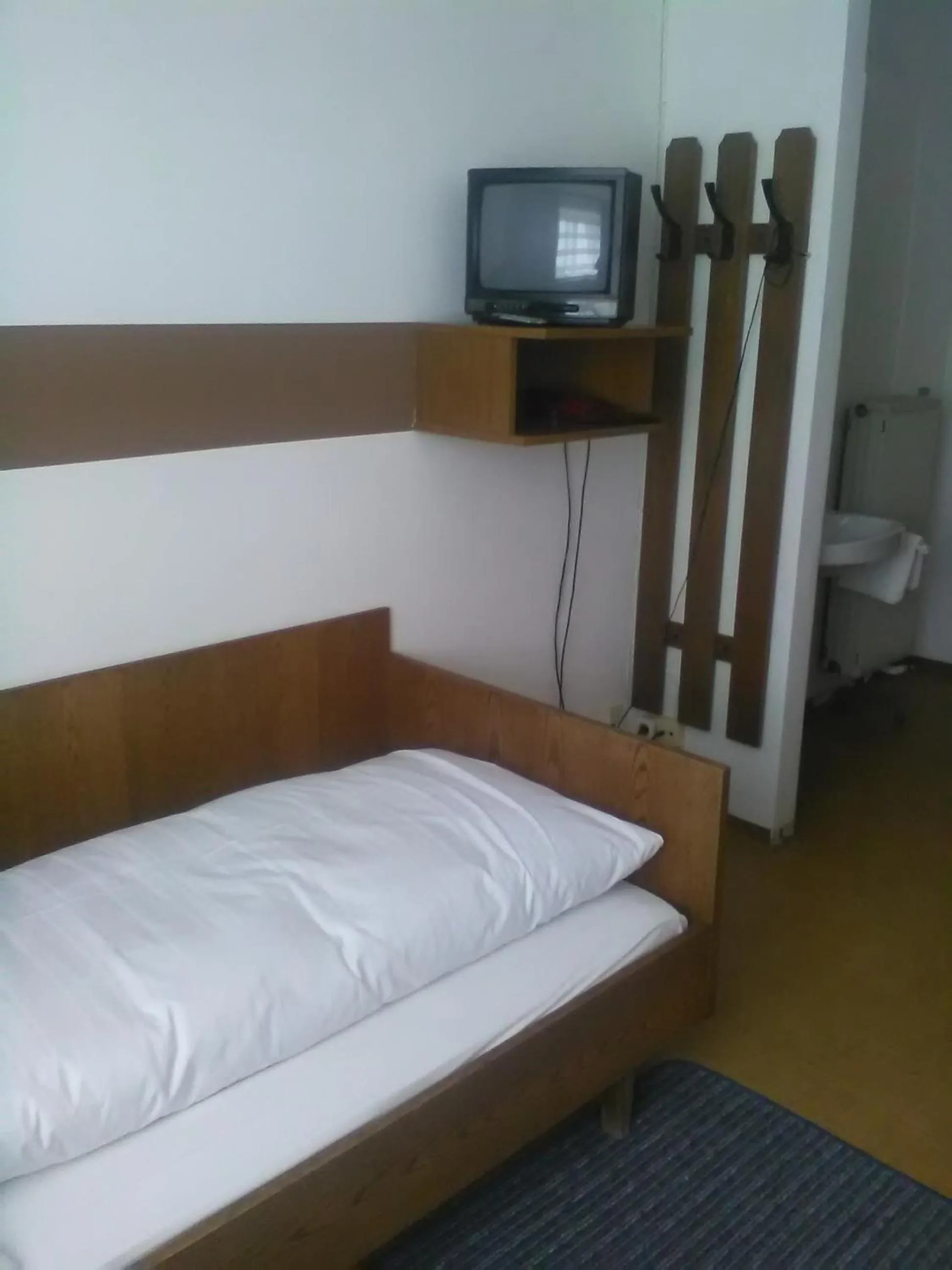 Photo of the whole room, Bed in Gasthof Schatzl