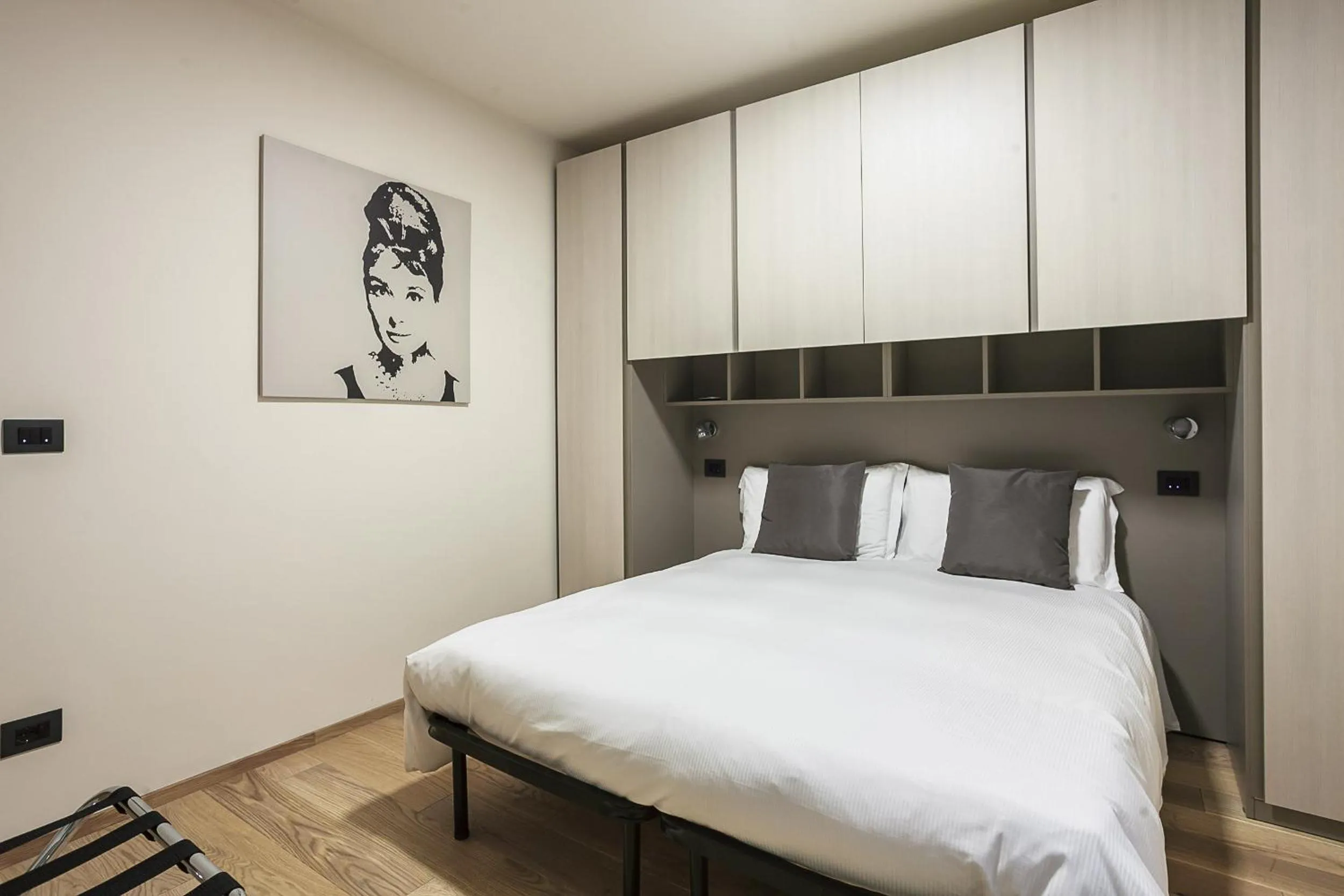 Bed in Residence Rizzoli-Suites Apartments