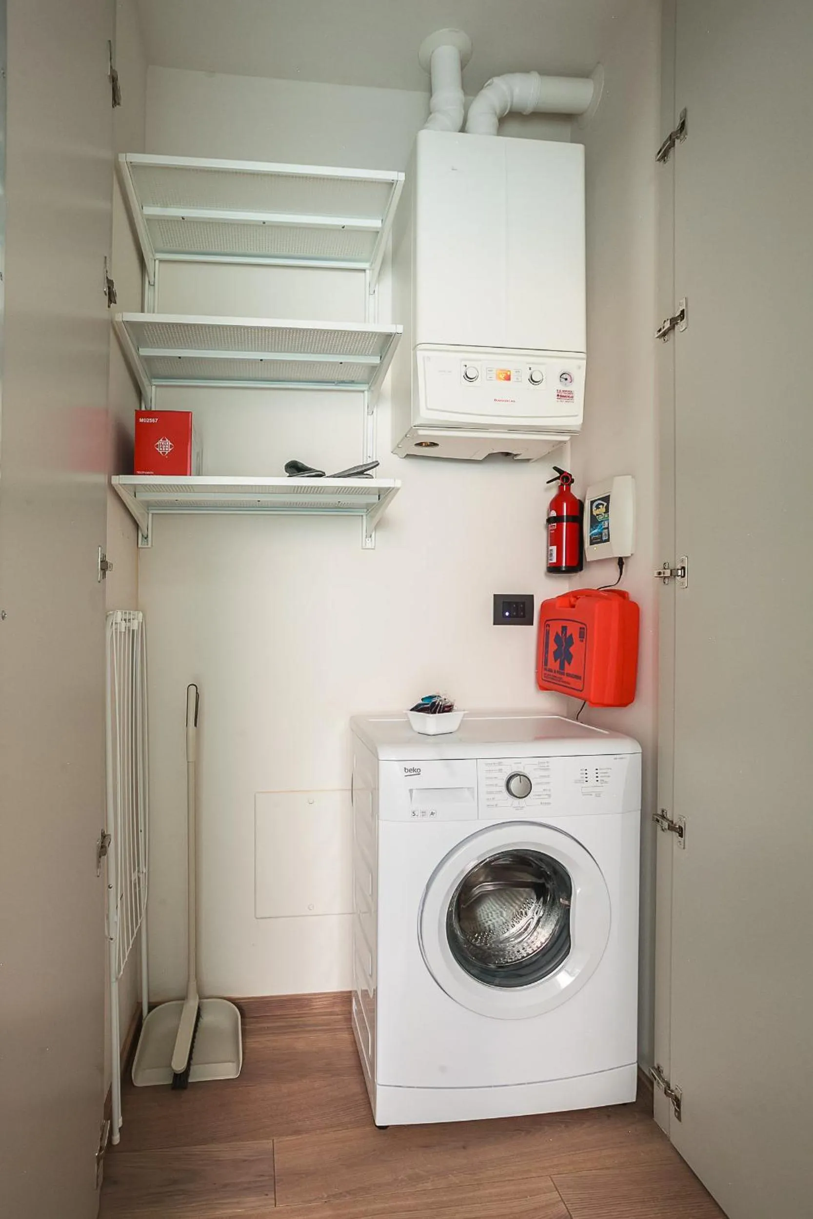 washing machine in Residence Rizzoli-Suites Apartments
