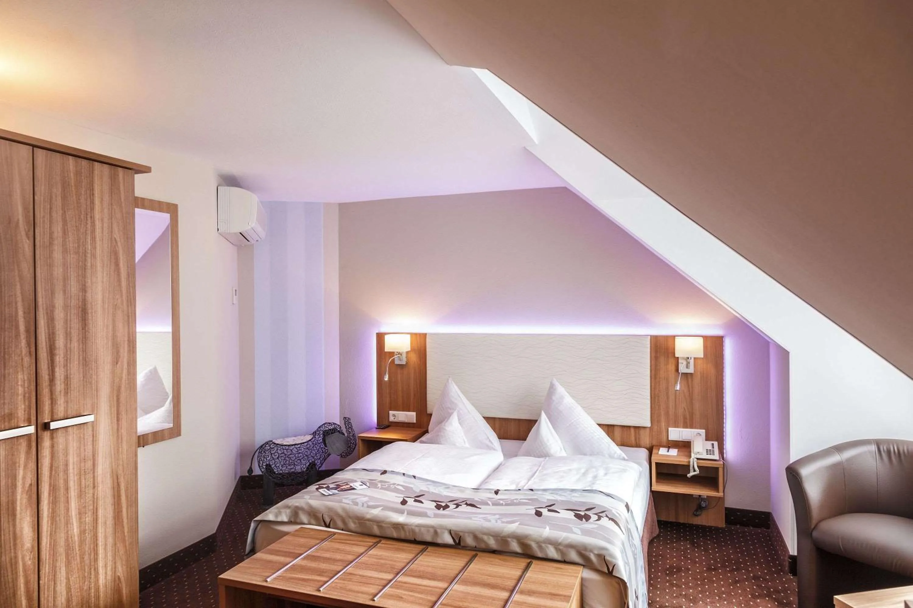 Bedroom, Bed in Best Western Plus Parkhotel Erding