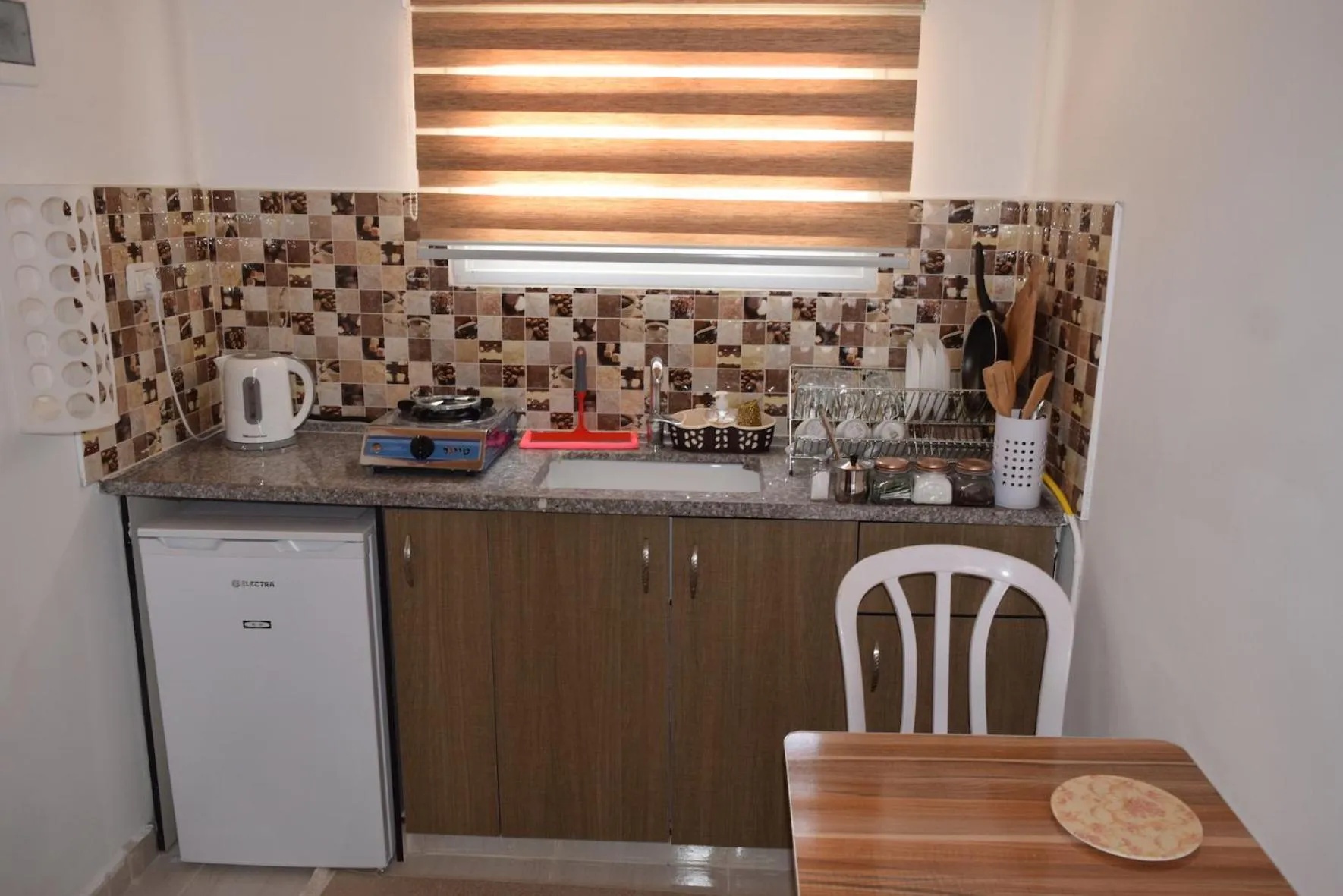 Kitchen or kitchenette in Khan Alsira - חאן אלסרה