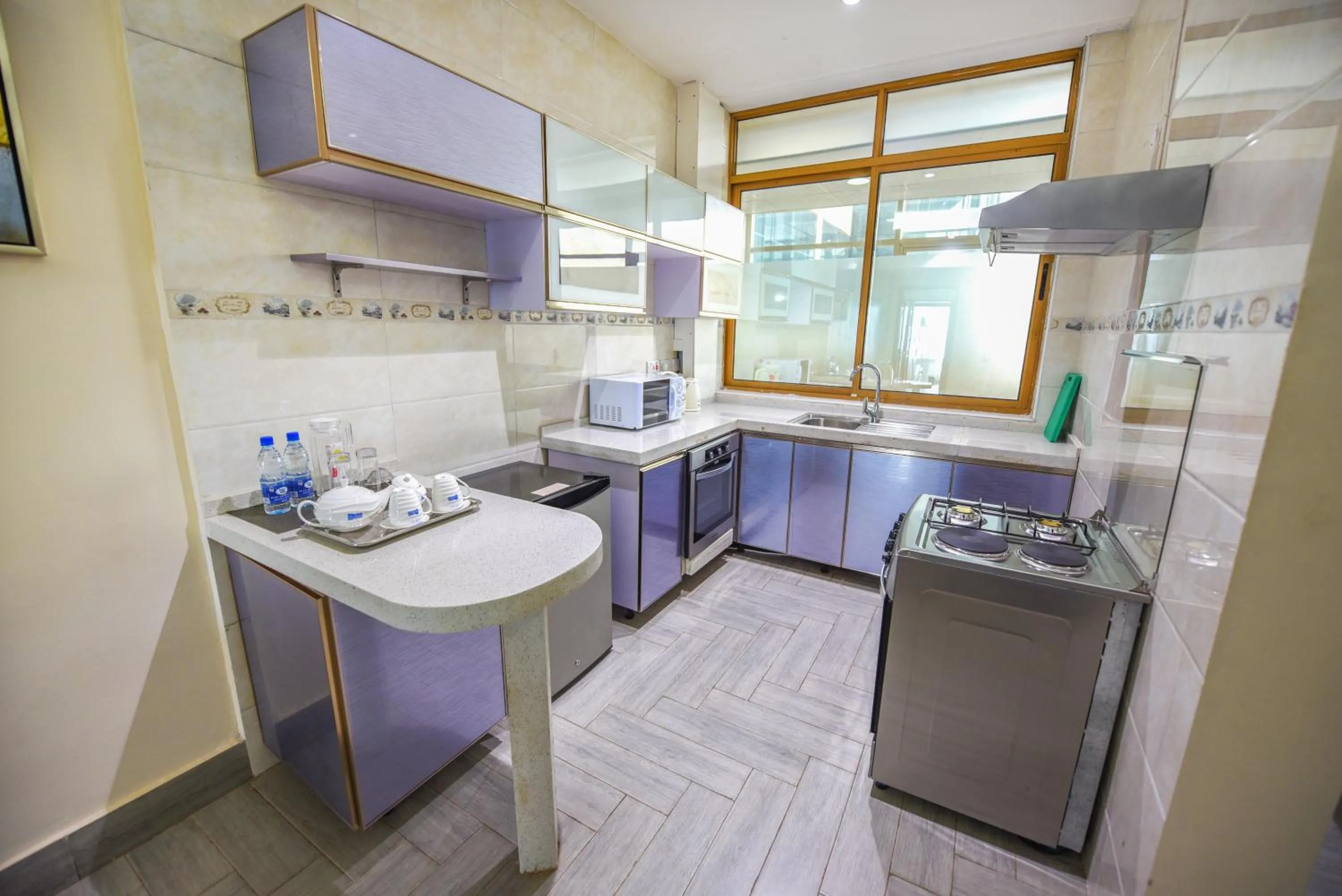Kitchen or kitchenette in BMK House Apartments