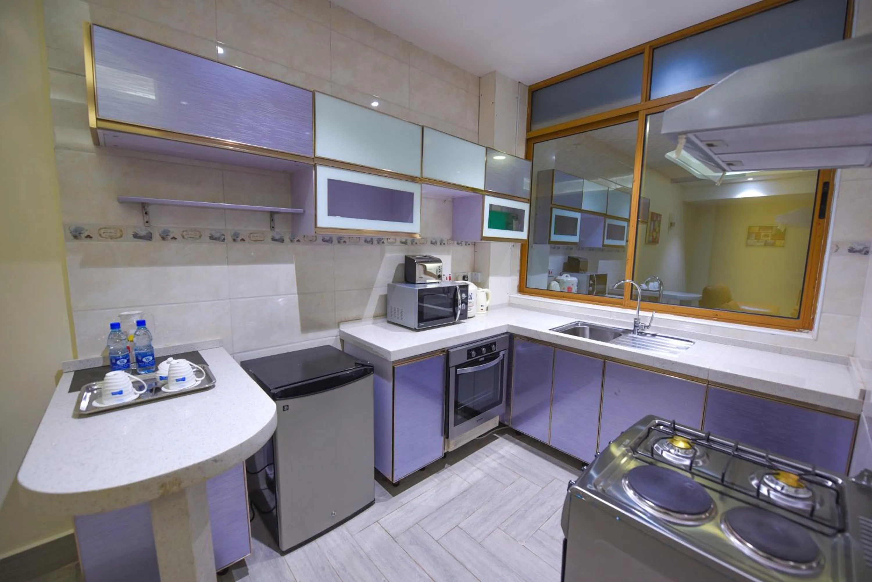 Kitchen or kitchenette in BMK House Apartments