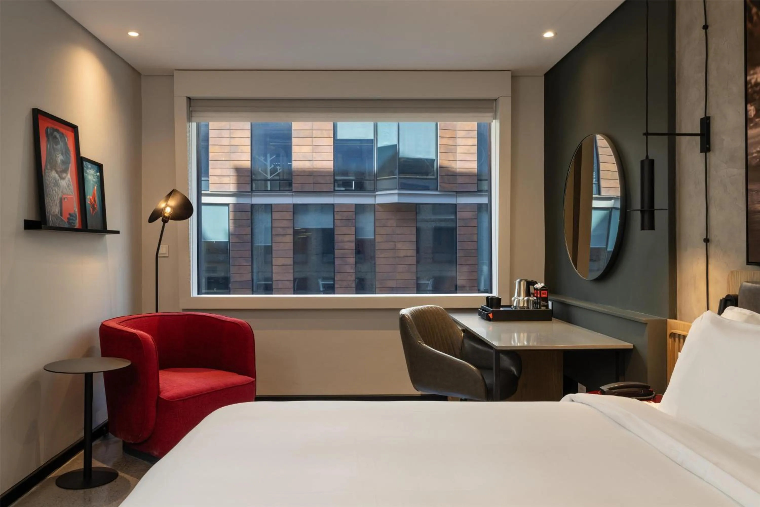 Photo of the whole room, Bed in Radisson RED Hotel V&A Waterfront Cape Town