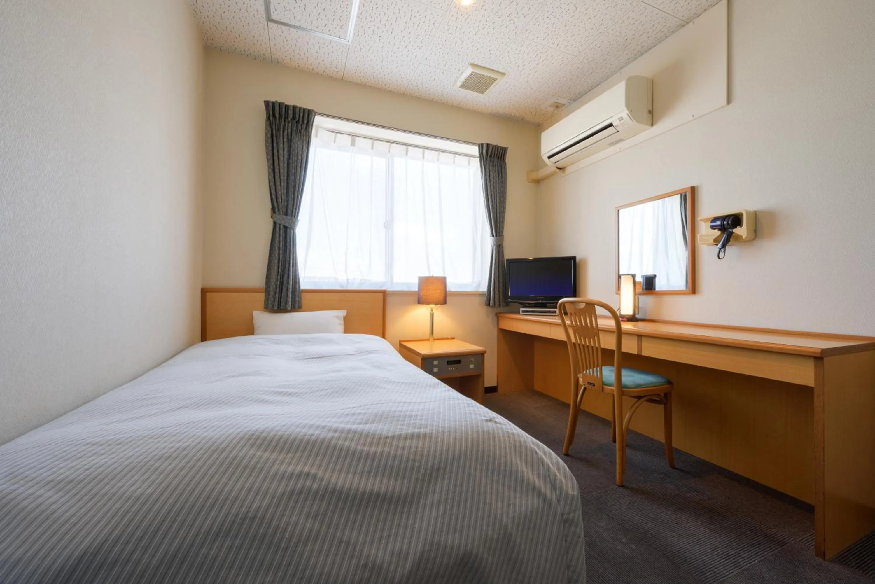 Photo of the whole room, Bed in Towada City Hotel