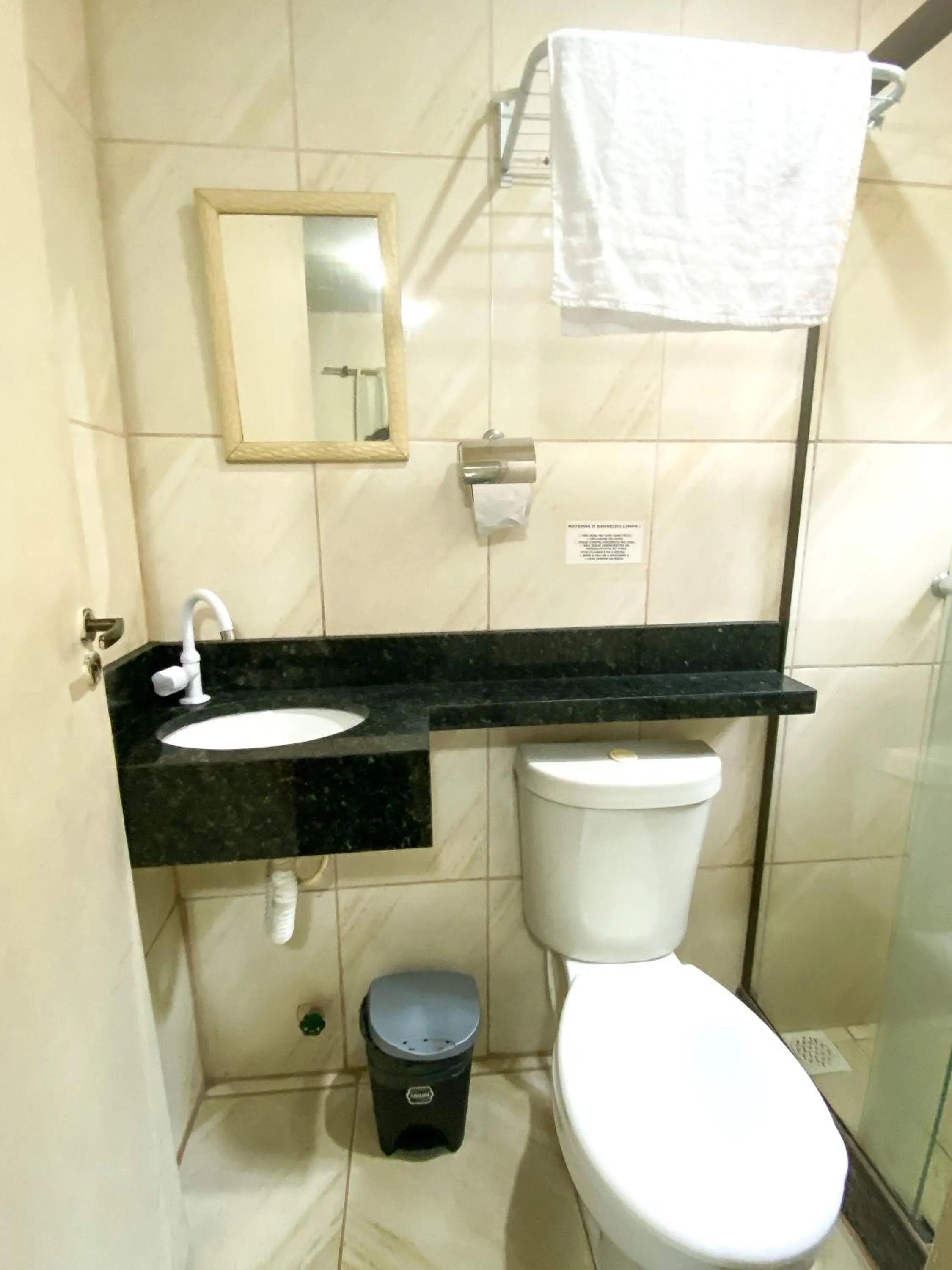 Toilet in Pousada Village Rio Centro