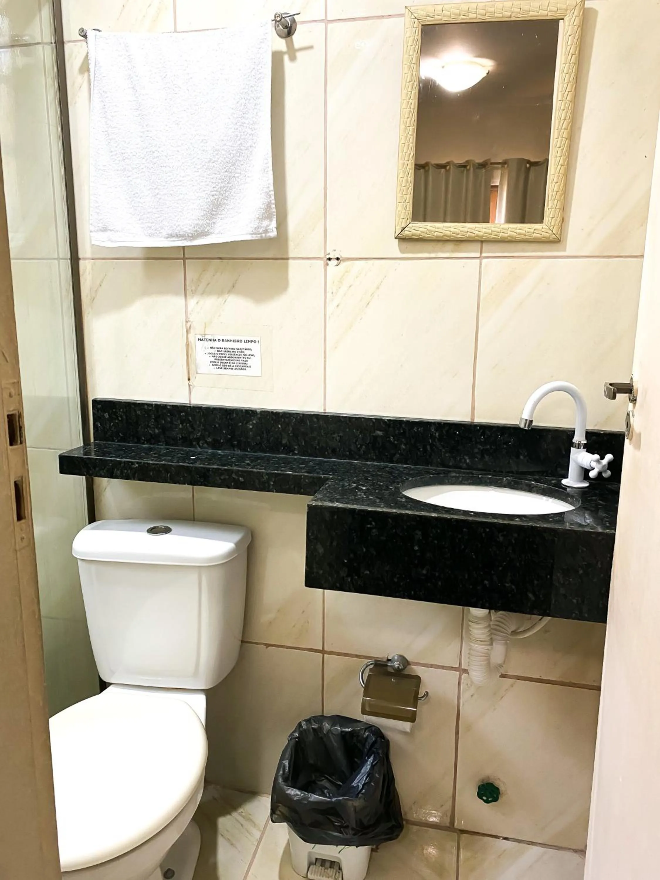 Toilet in Pousada Village Rio Centro