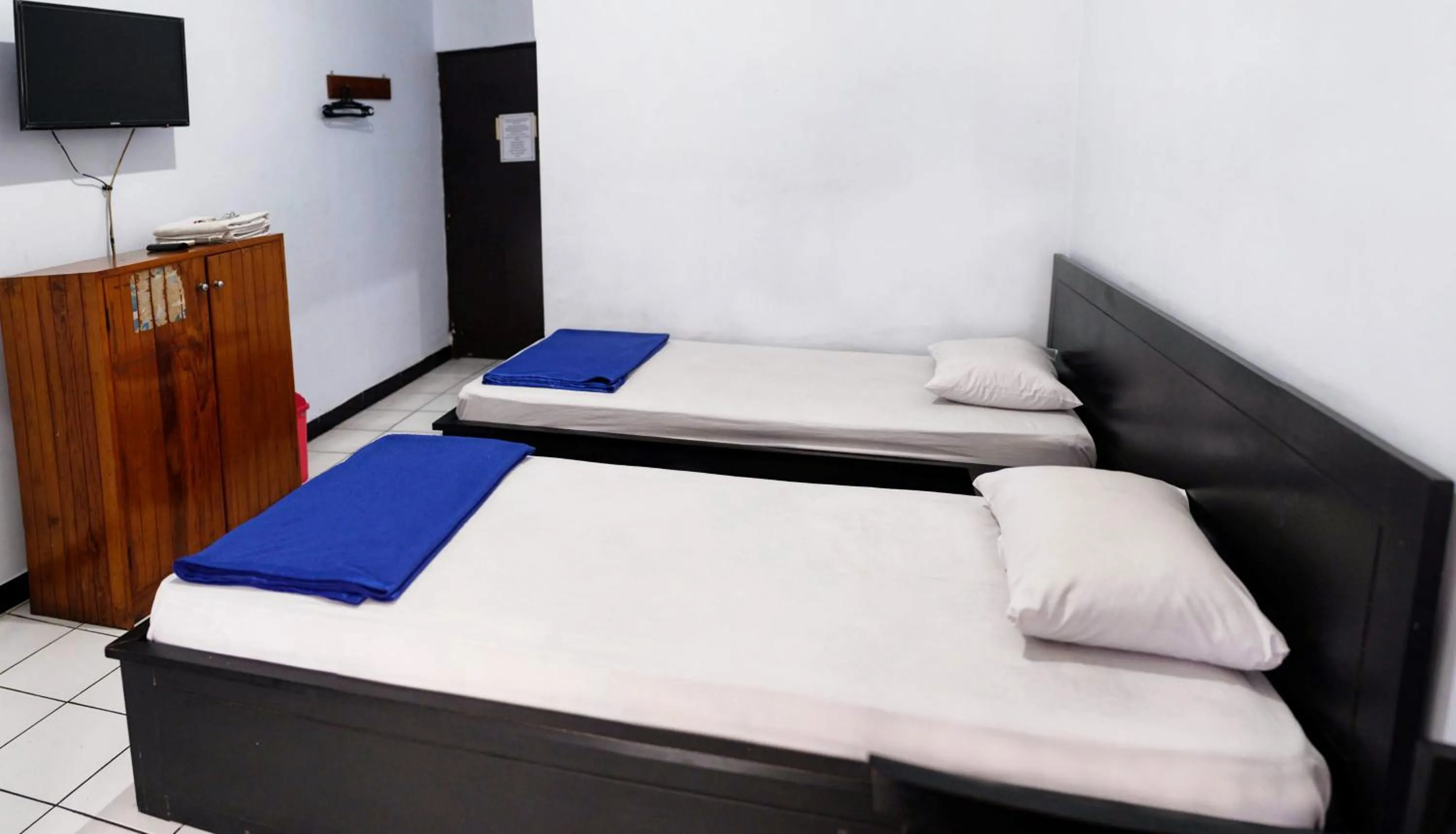 Bedroom, Bed in Hotel Wisata