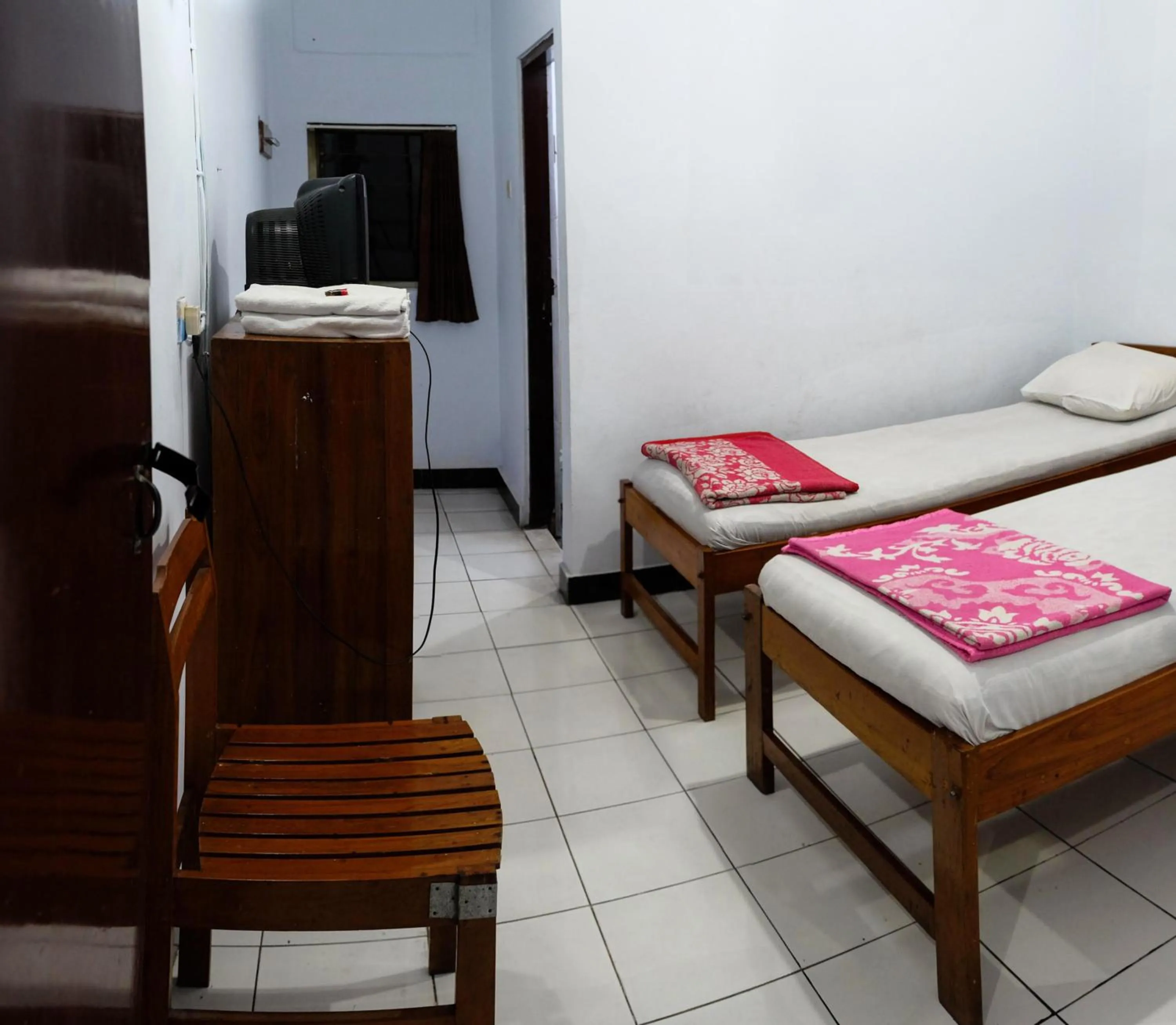 Bedroom, Bed in Hotel Wisata