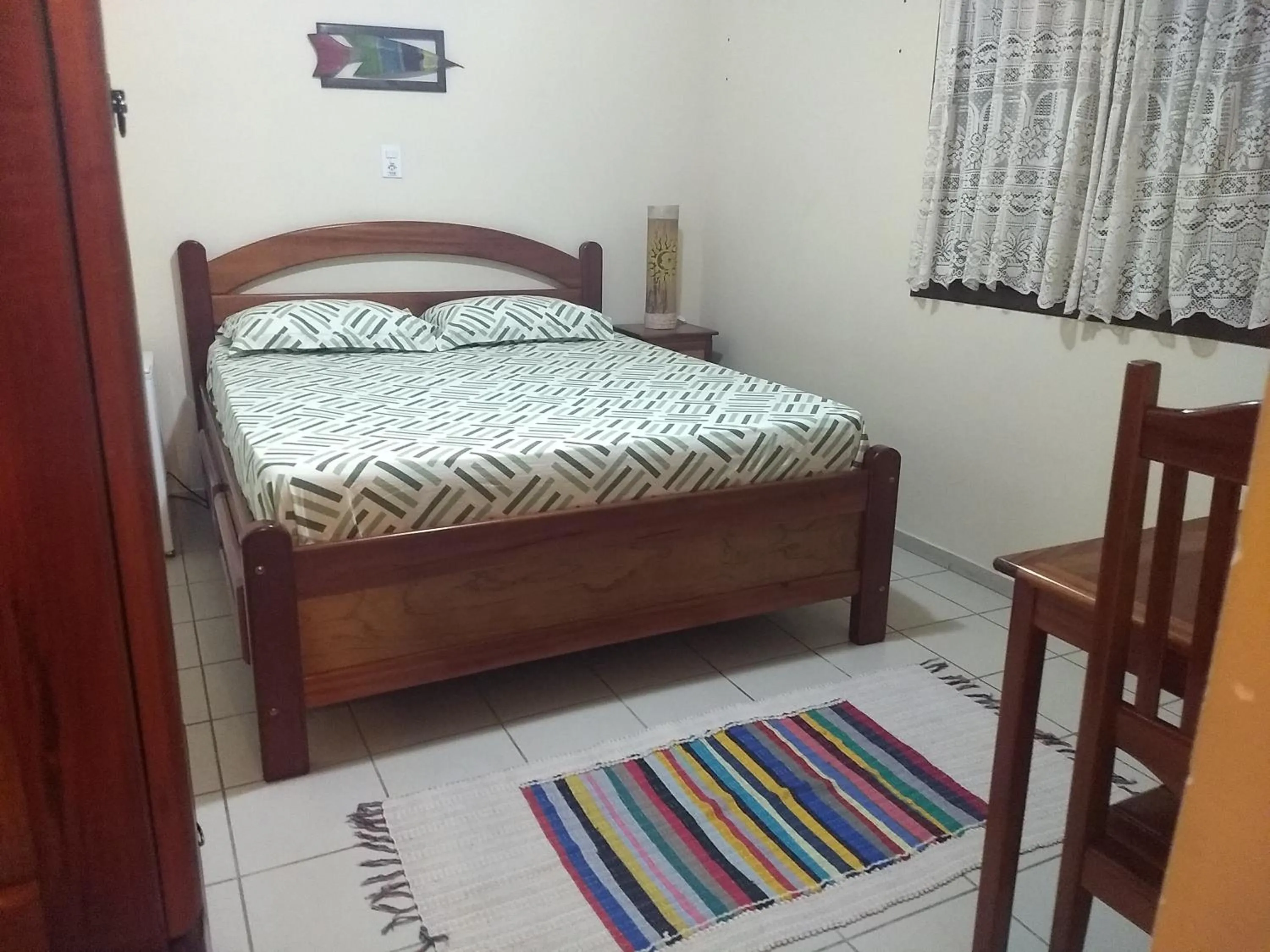 Bed in Pousada Castelinho