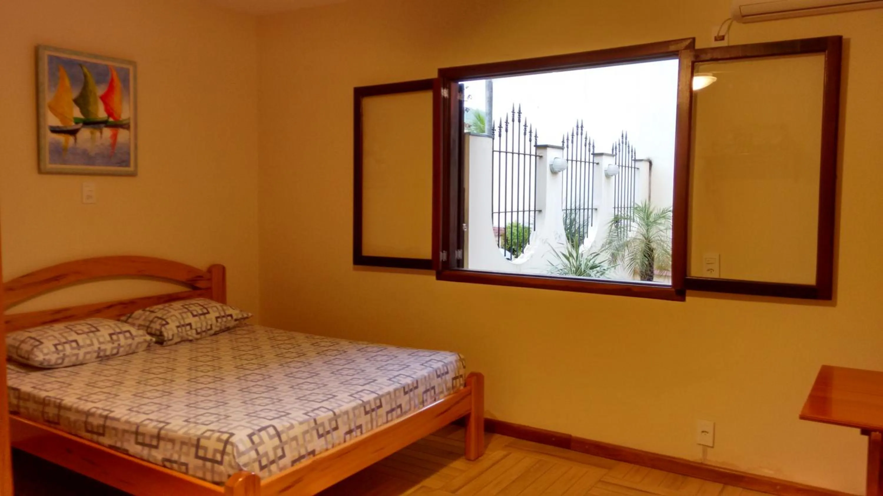 Bed in Pousada Castelinho
