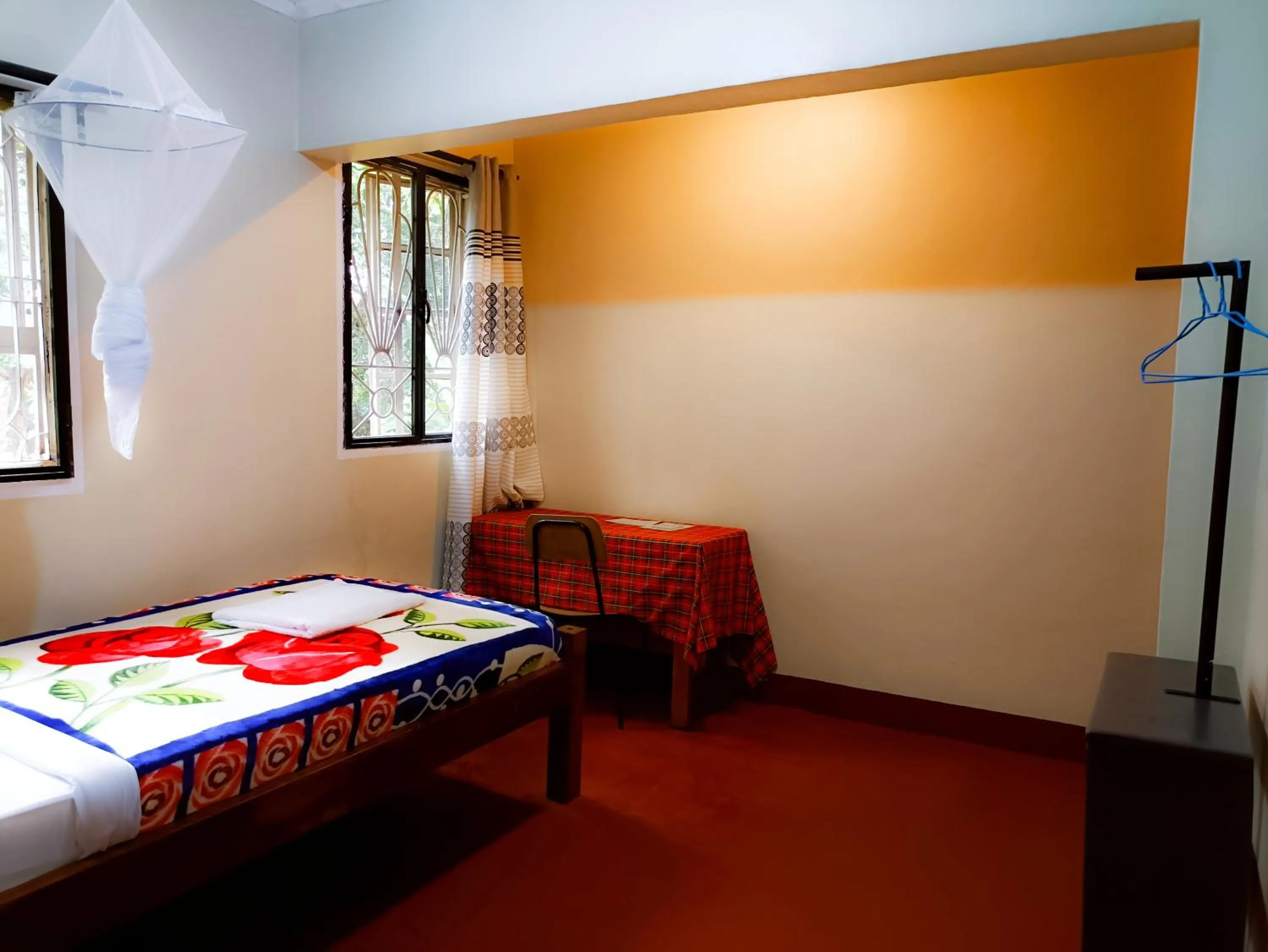 Bed in Endasawa Tree Lodge