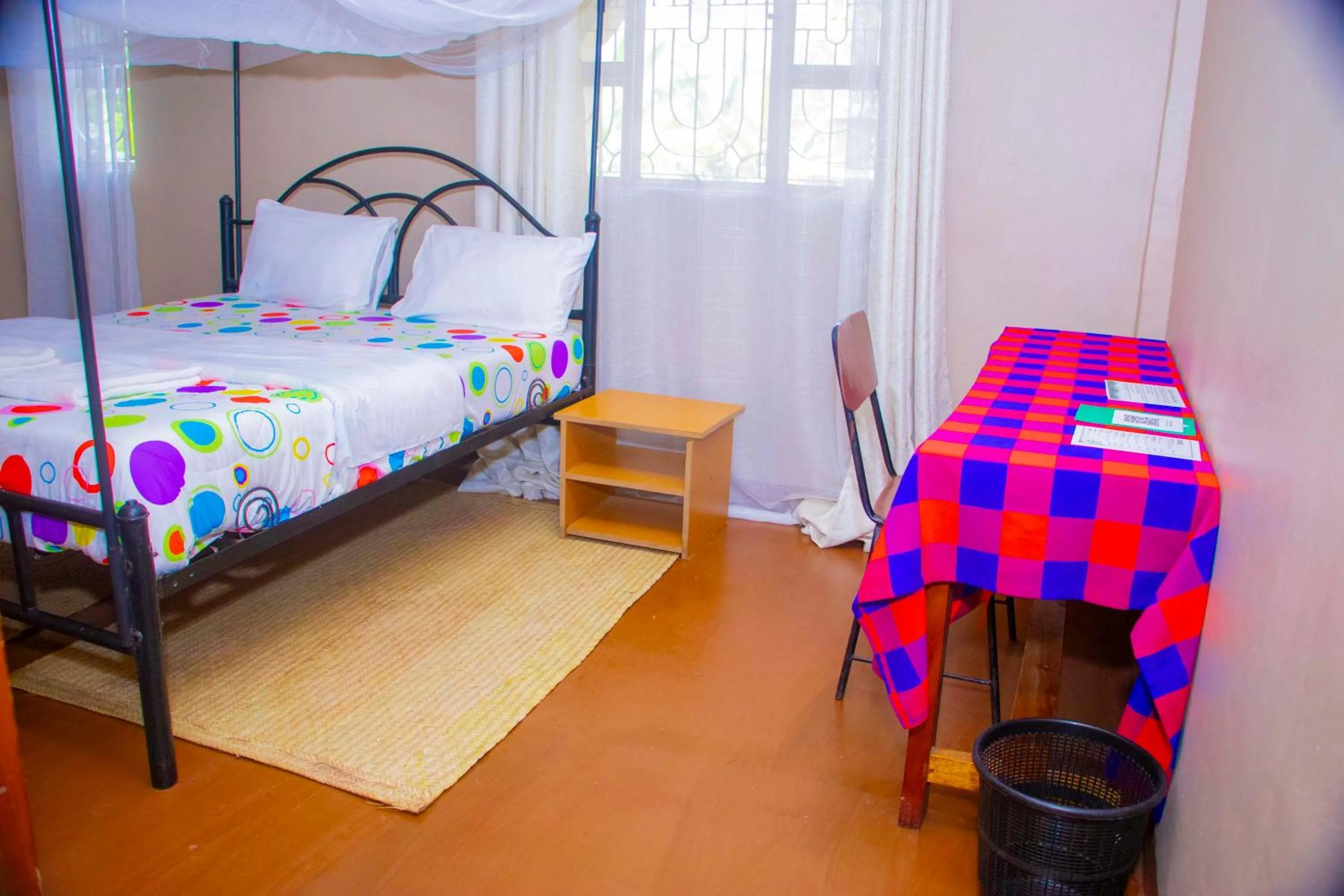 Bed in Endasawa Tree Lodge