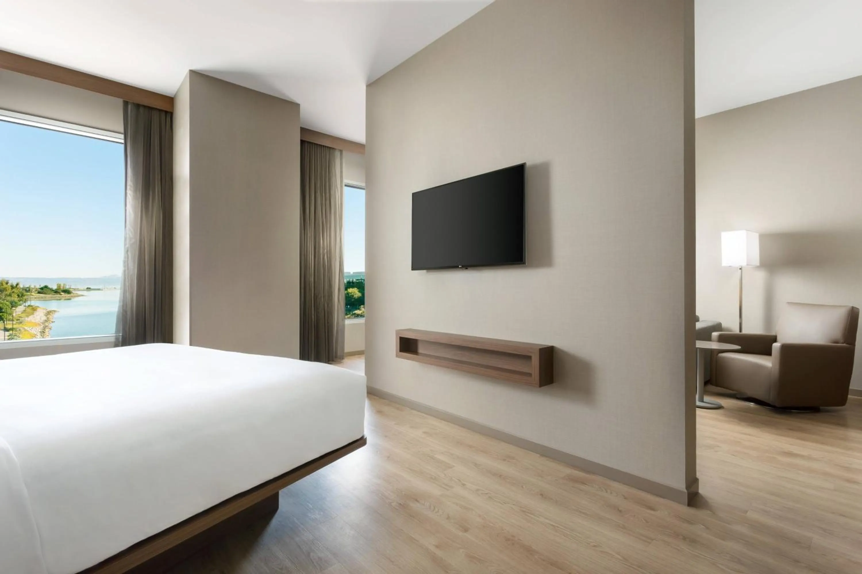 Photo of the whole room, Bed in AC Hotel by Marriott San Francisco Airport/Oyster Point Waterfront