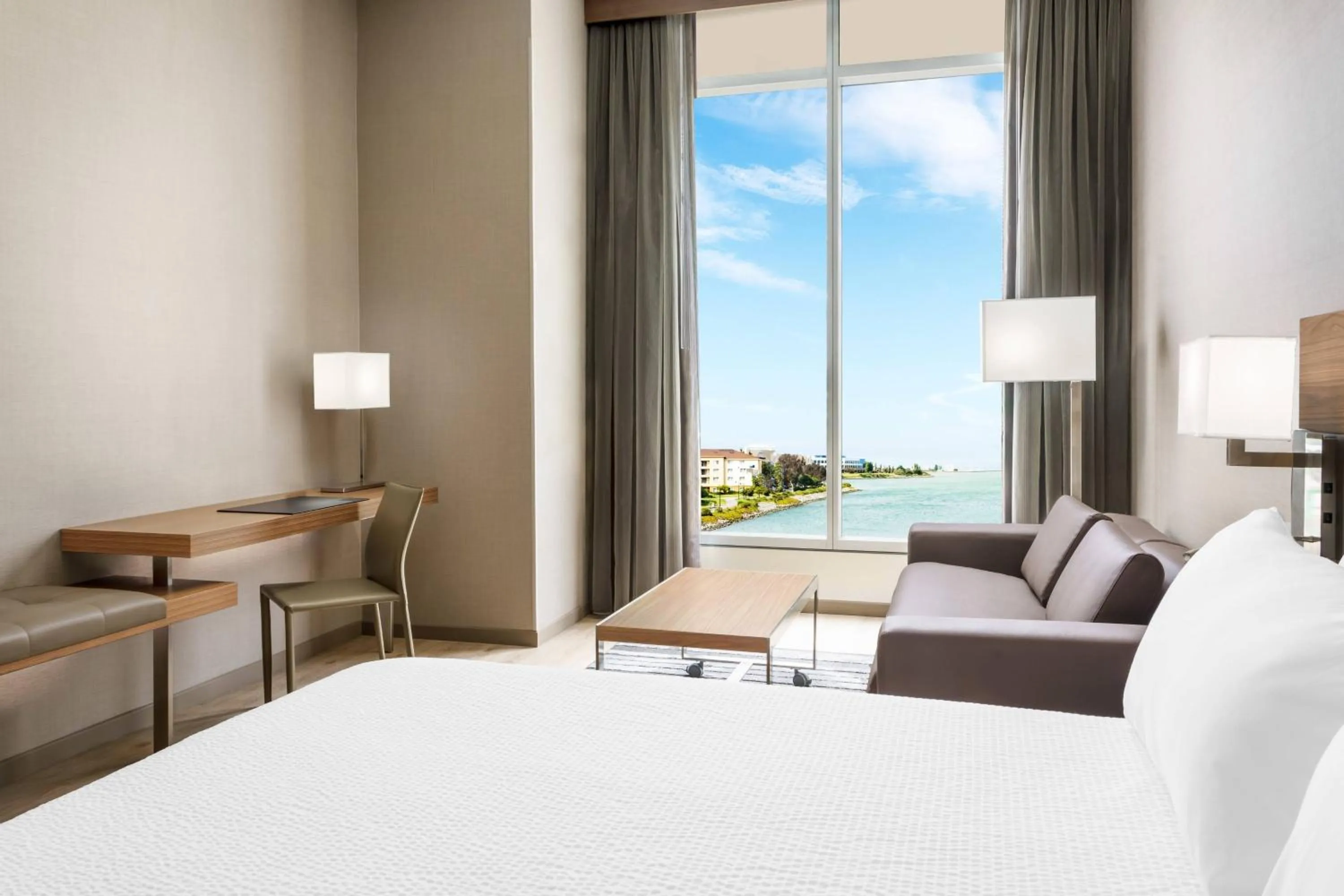 Photo of the whole room, Bed in AC Hotel by Marriott San Francisco Airport/Oyster Point Waterfront