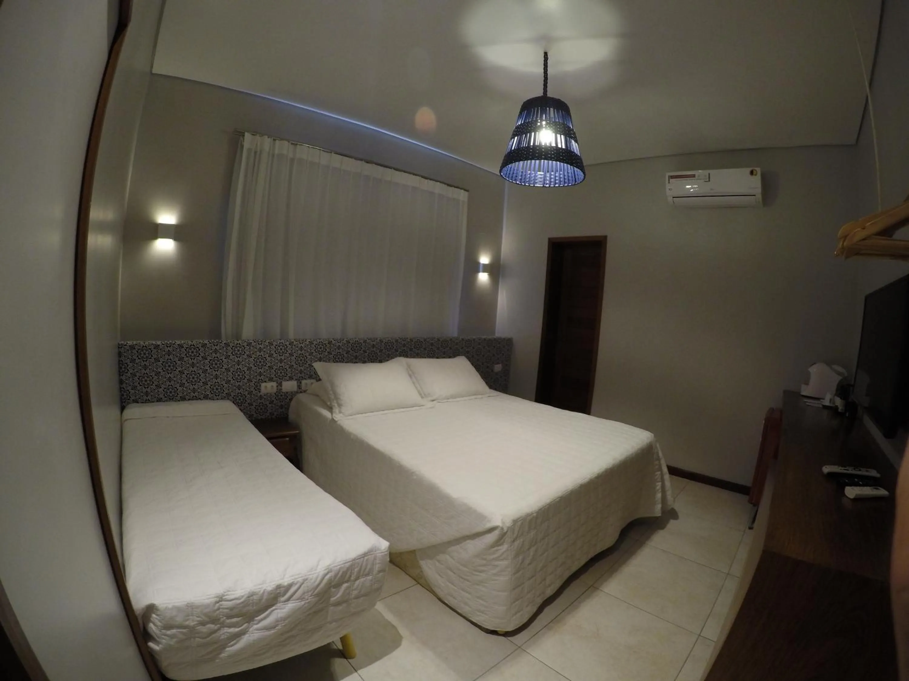 Bed in Pousada Nascer do Sol